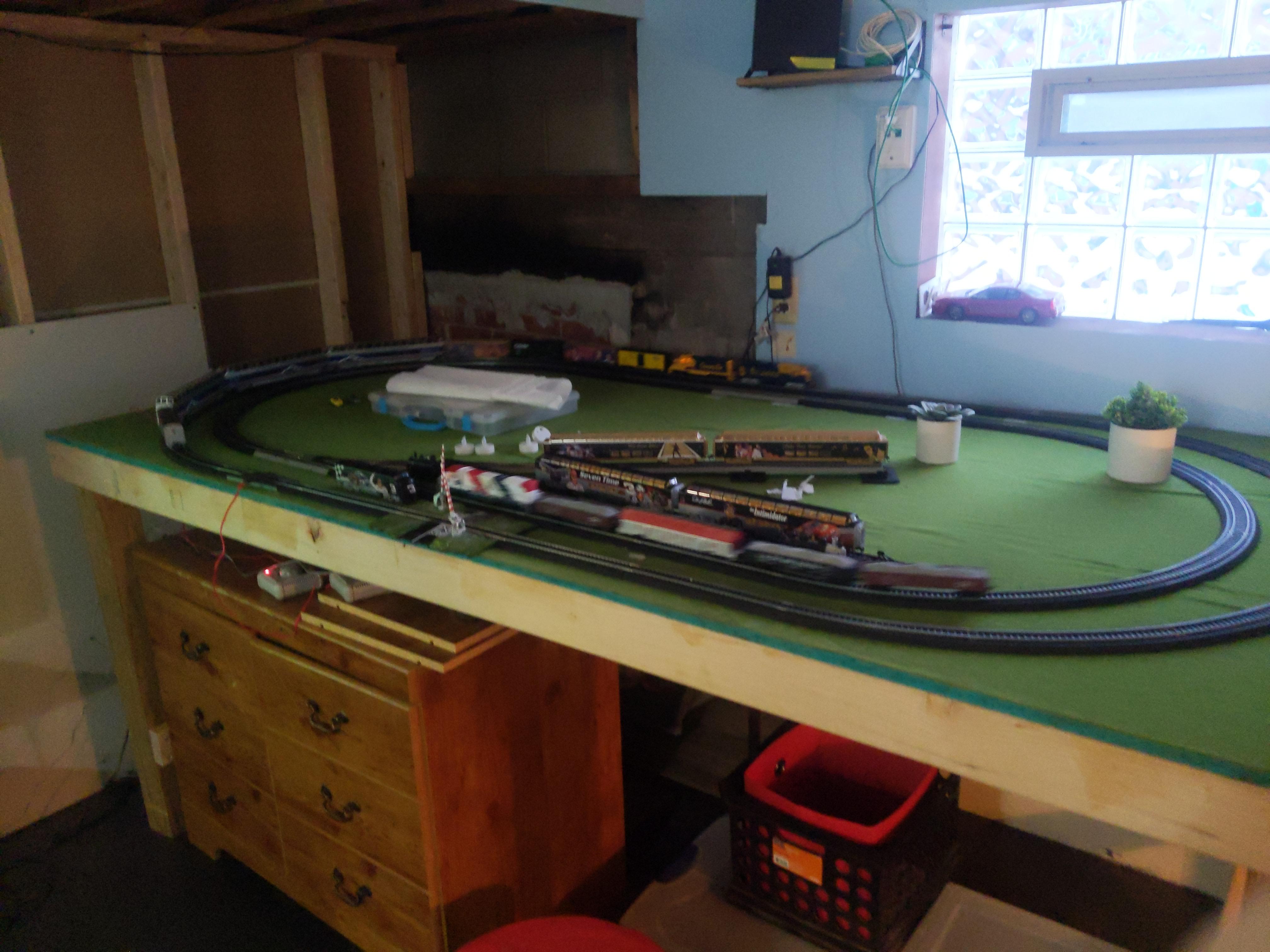 My '4'8 HO scale train table i love it so much i love running long