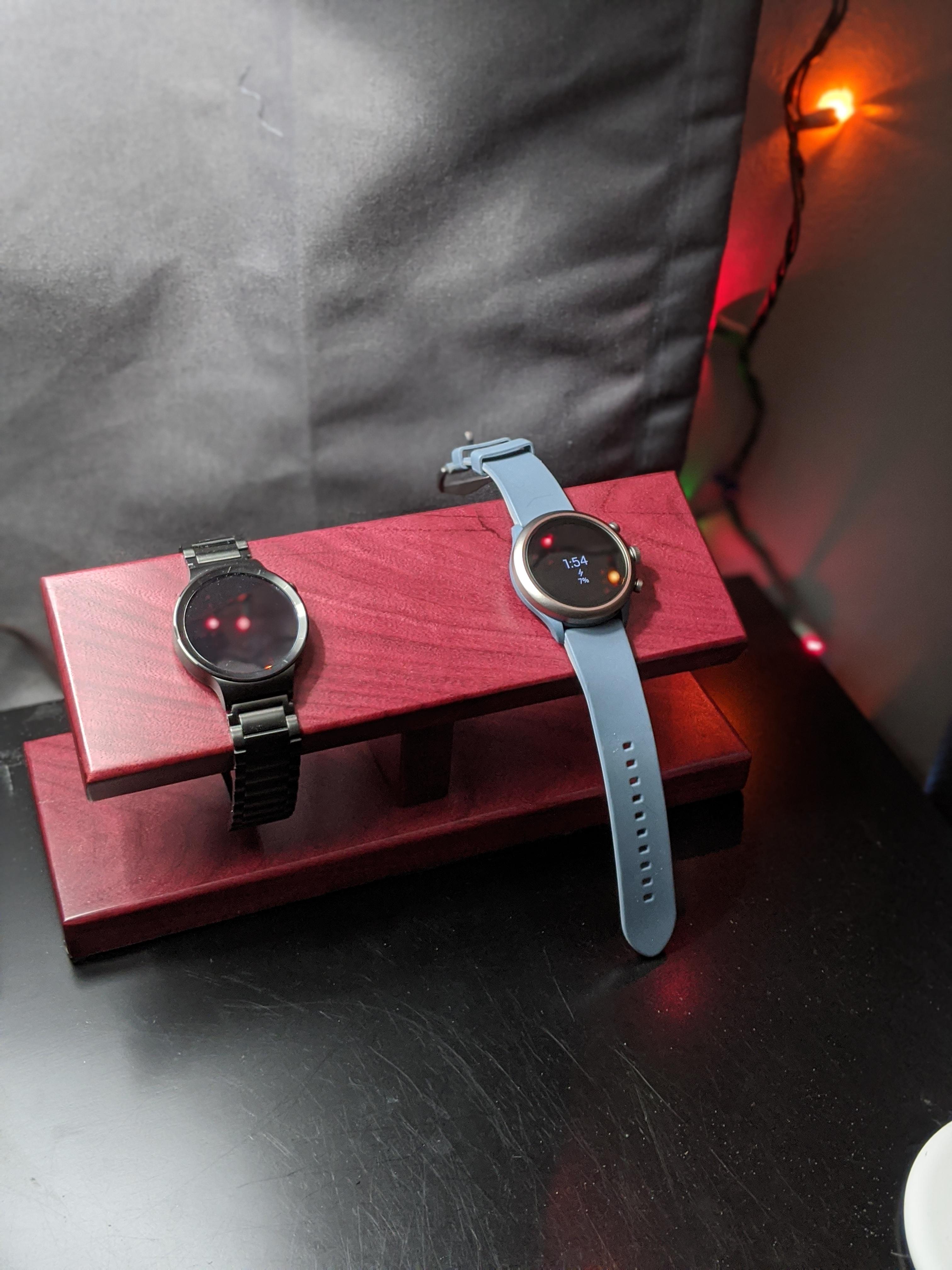 Made a custom wooden watch stand with built in chargers for my Huawei