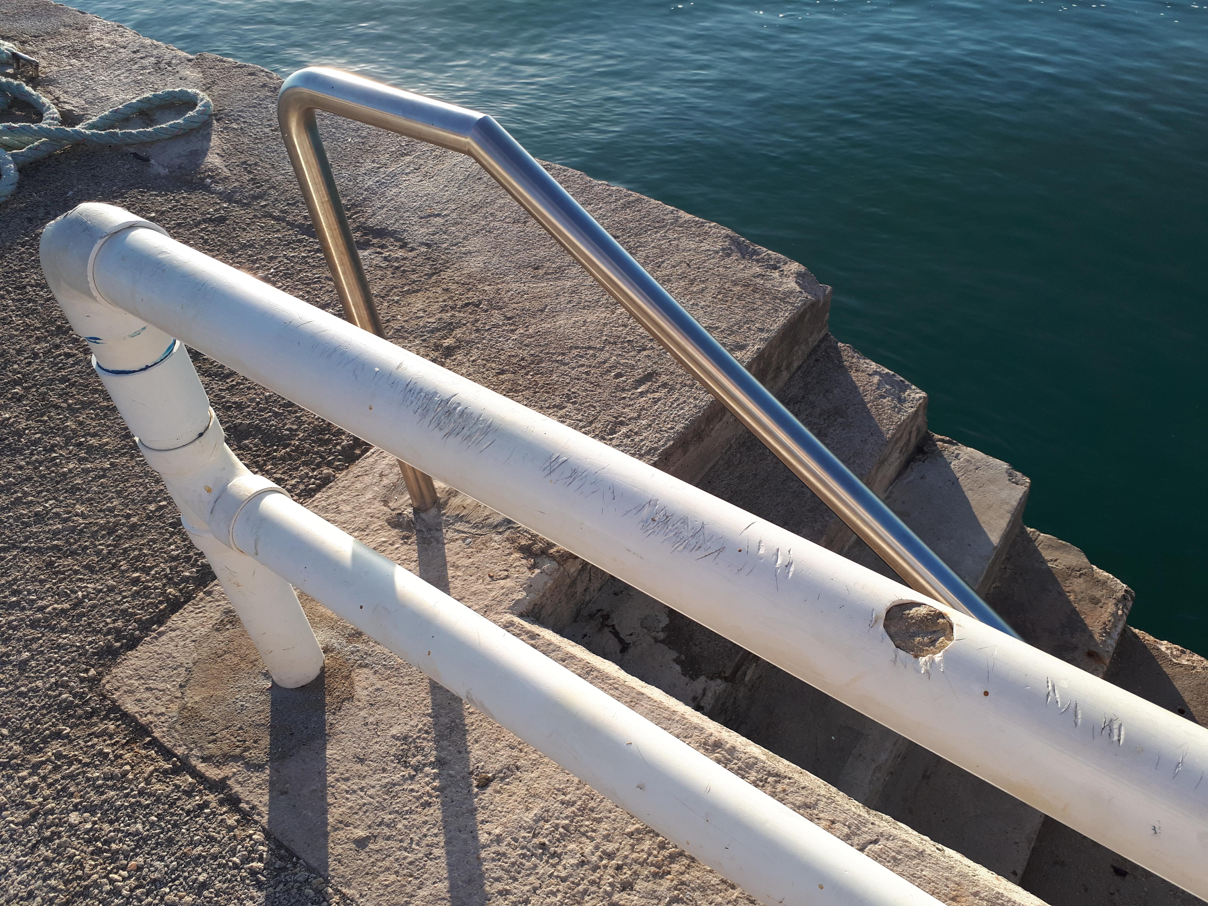 The railing here is made out of PVC pipes filled with cement r