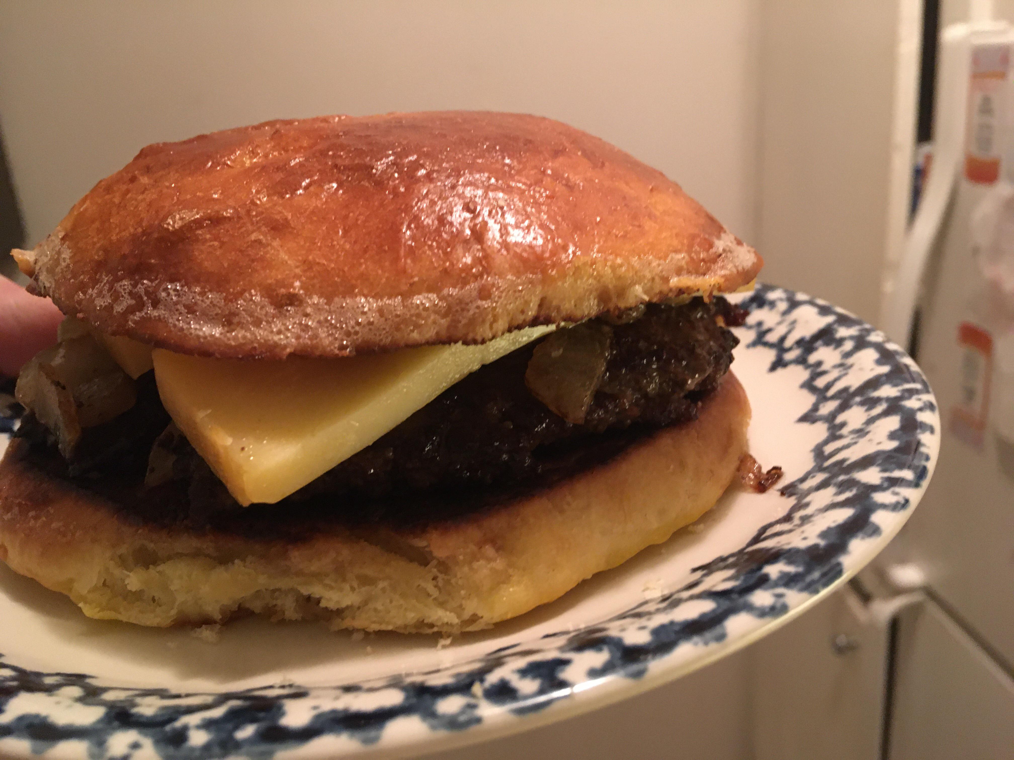 Cheeseburger with onions and gouda on homemade brioche buns r/FoodPorn