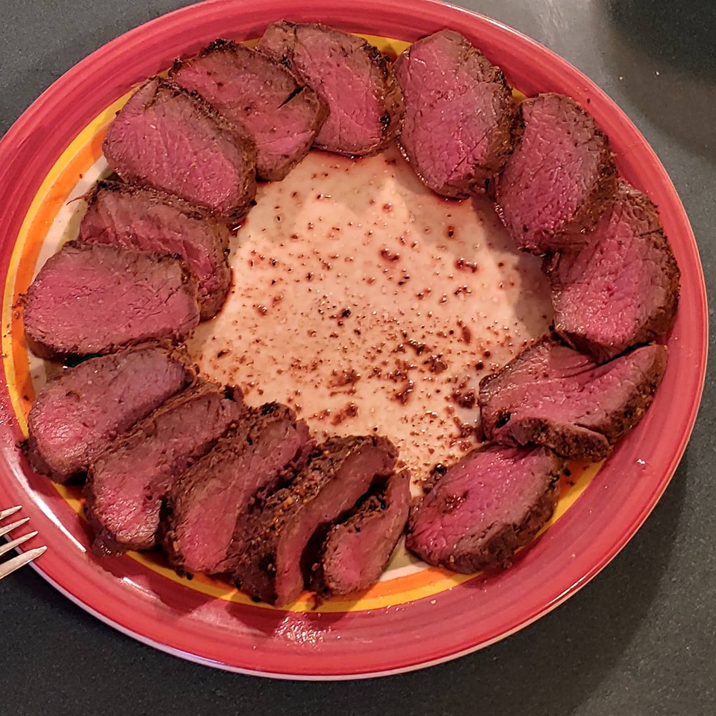 Venison backstrap in cast iron with cracked pepper and truffle salt