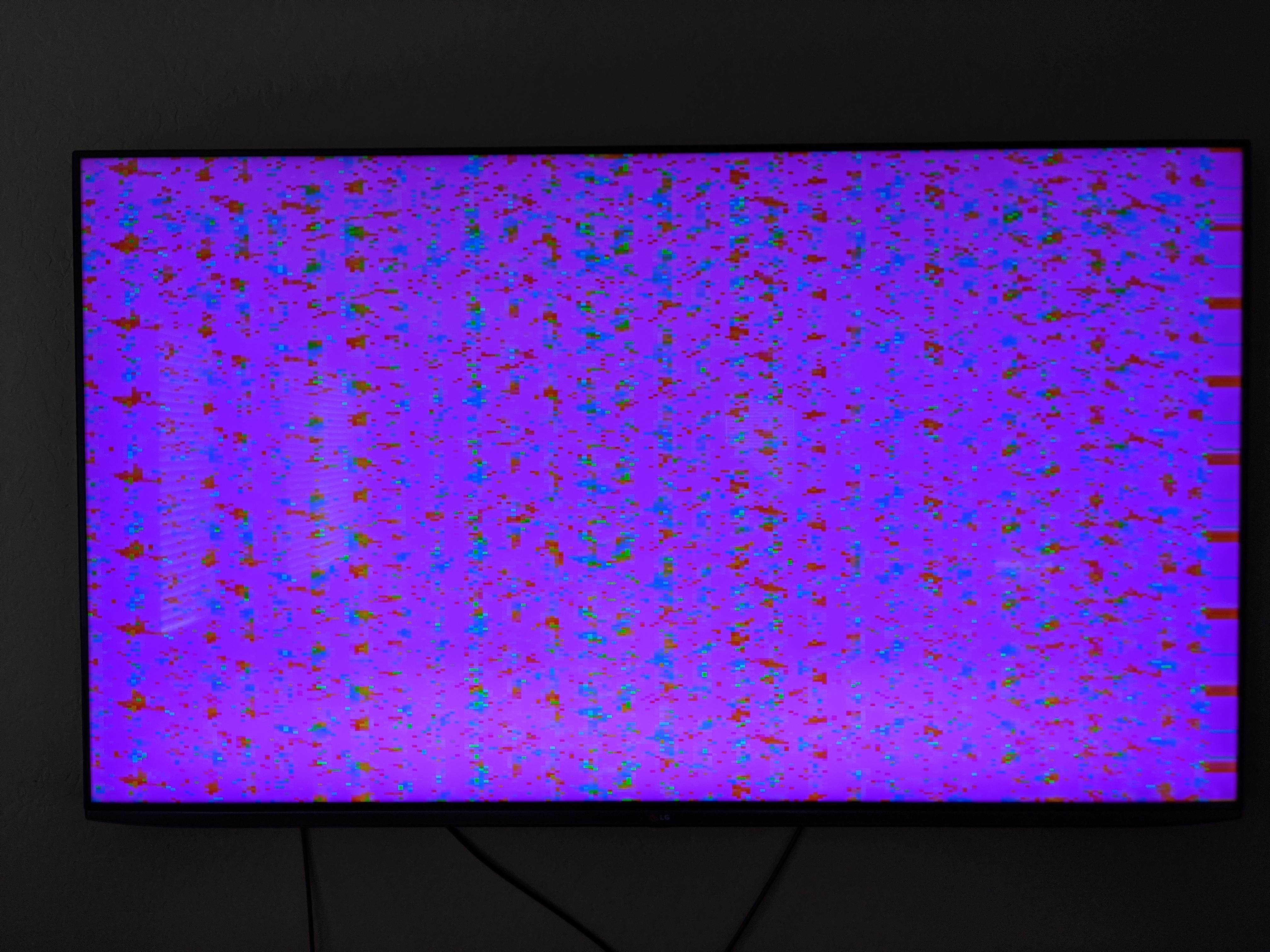 Pink screen on LG TV. Audio works, menus work but screen is scrambled