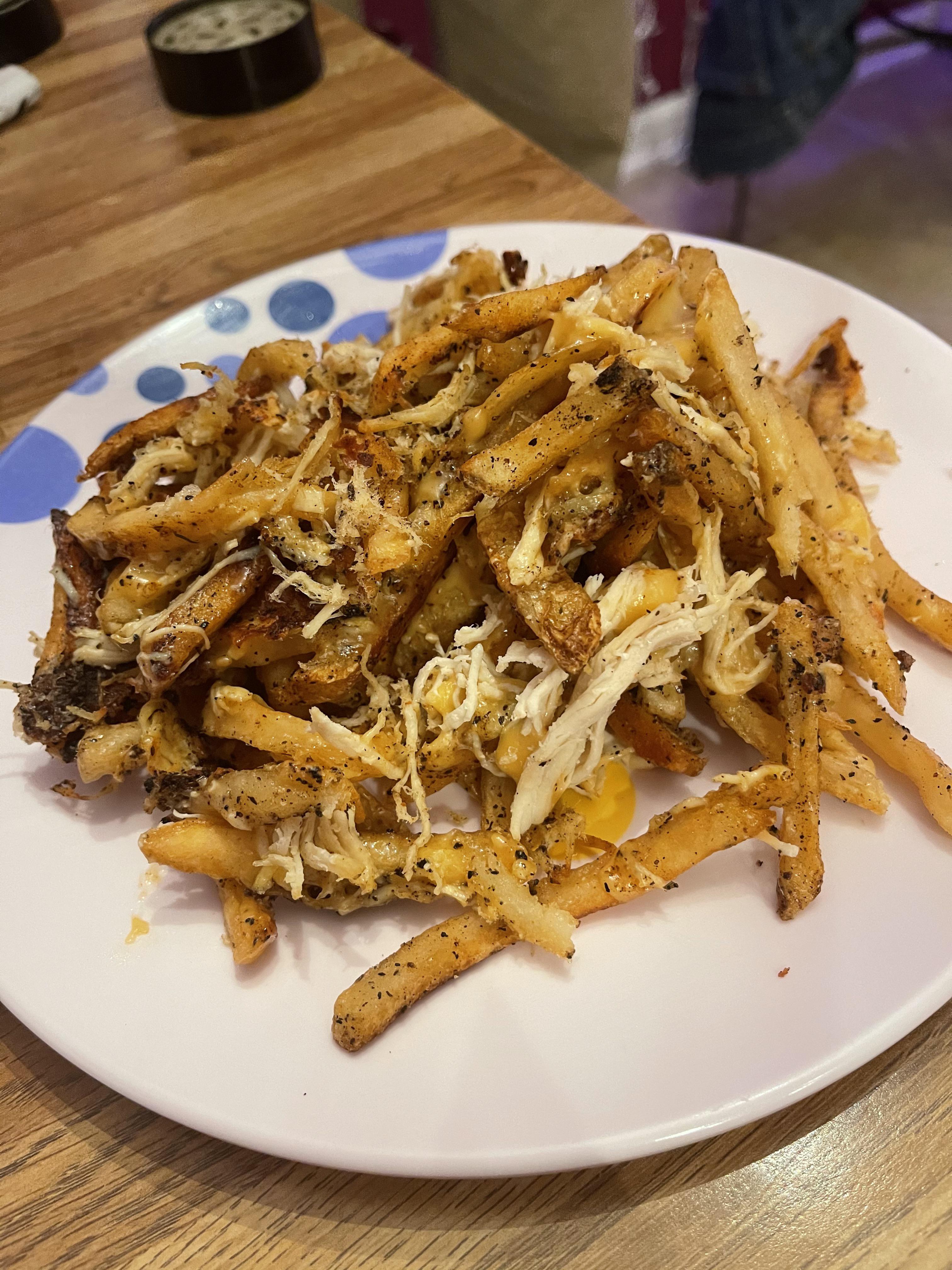 Left over McDonald’s fries pan seared with a tad of olive oil, melted
