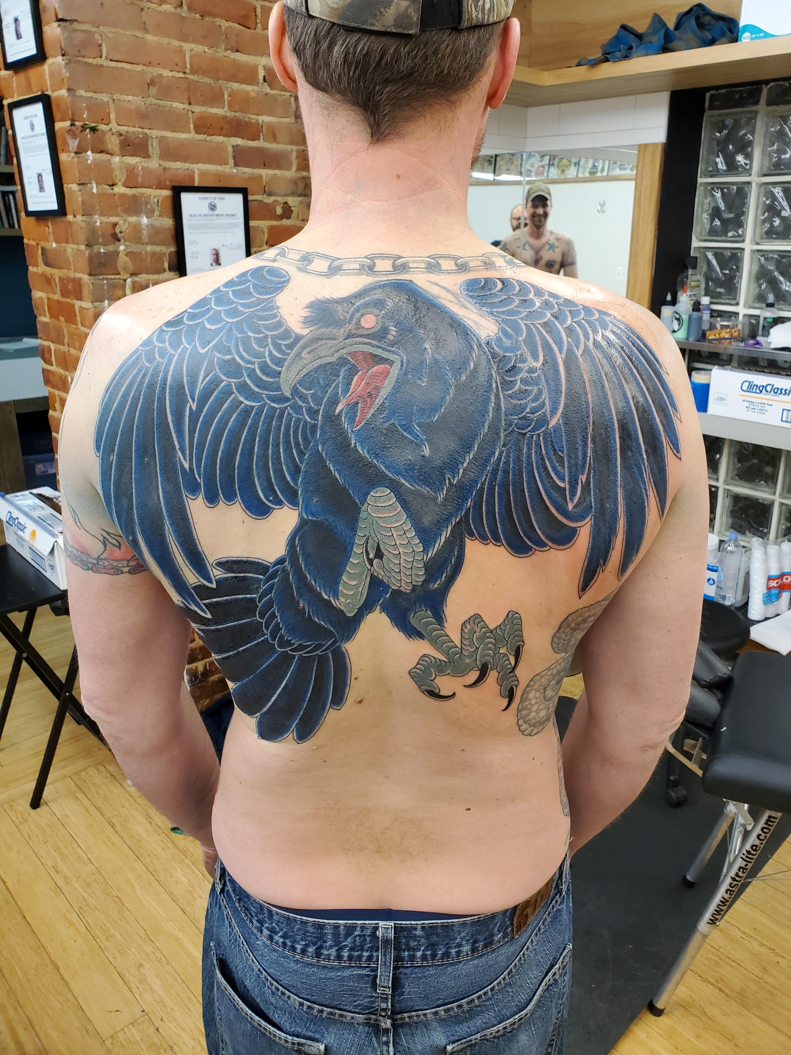 My raven covering up old tribal by Kyle Sajban of Hand of