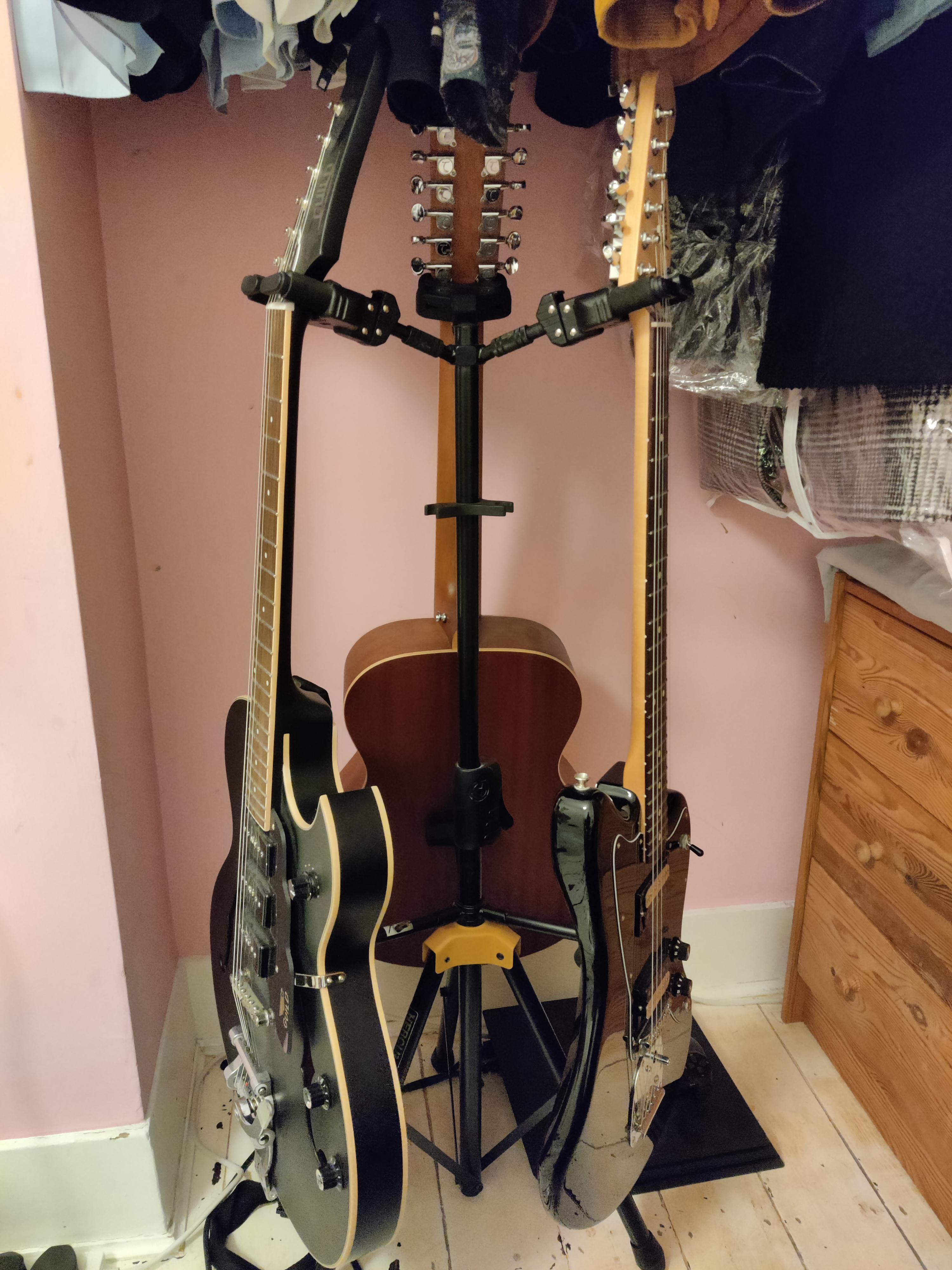 Will hanging guitars by the headstock permanently damage them? r/guitars