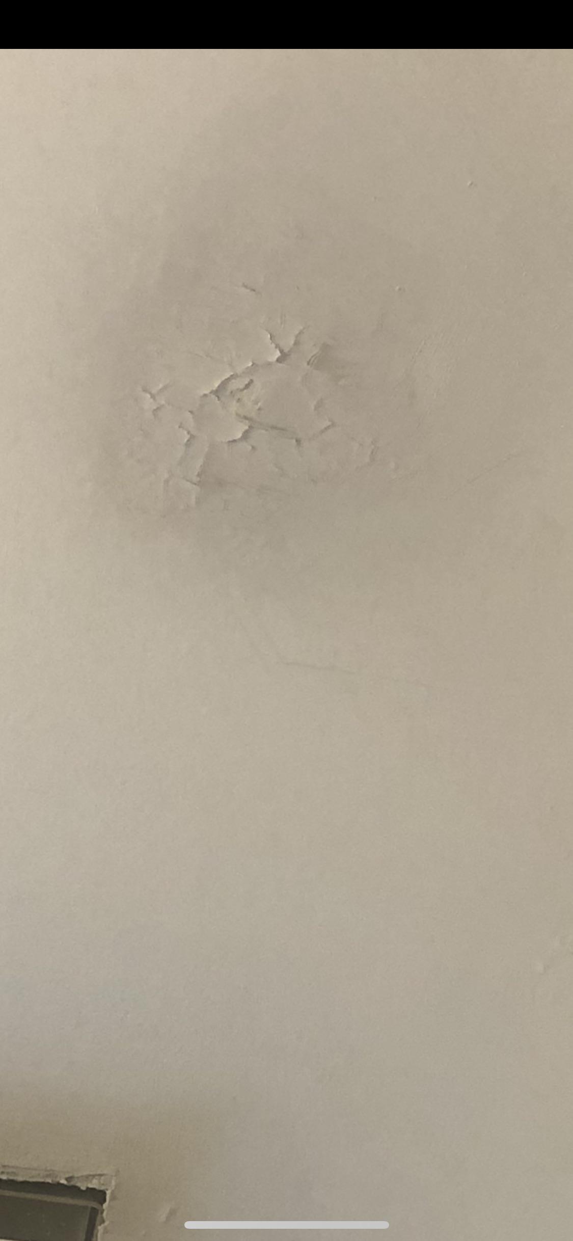 Paint chipping on bathroom ceiling. No water leakage. Above this is another bathroom which is