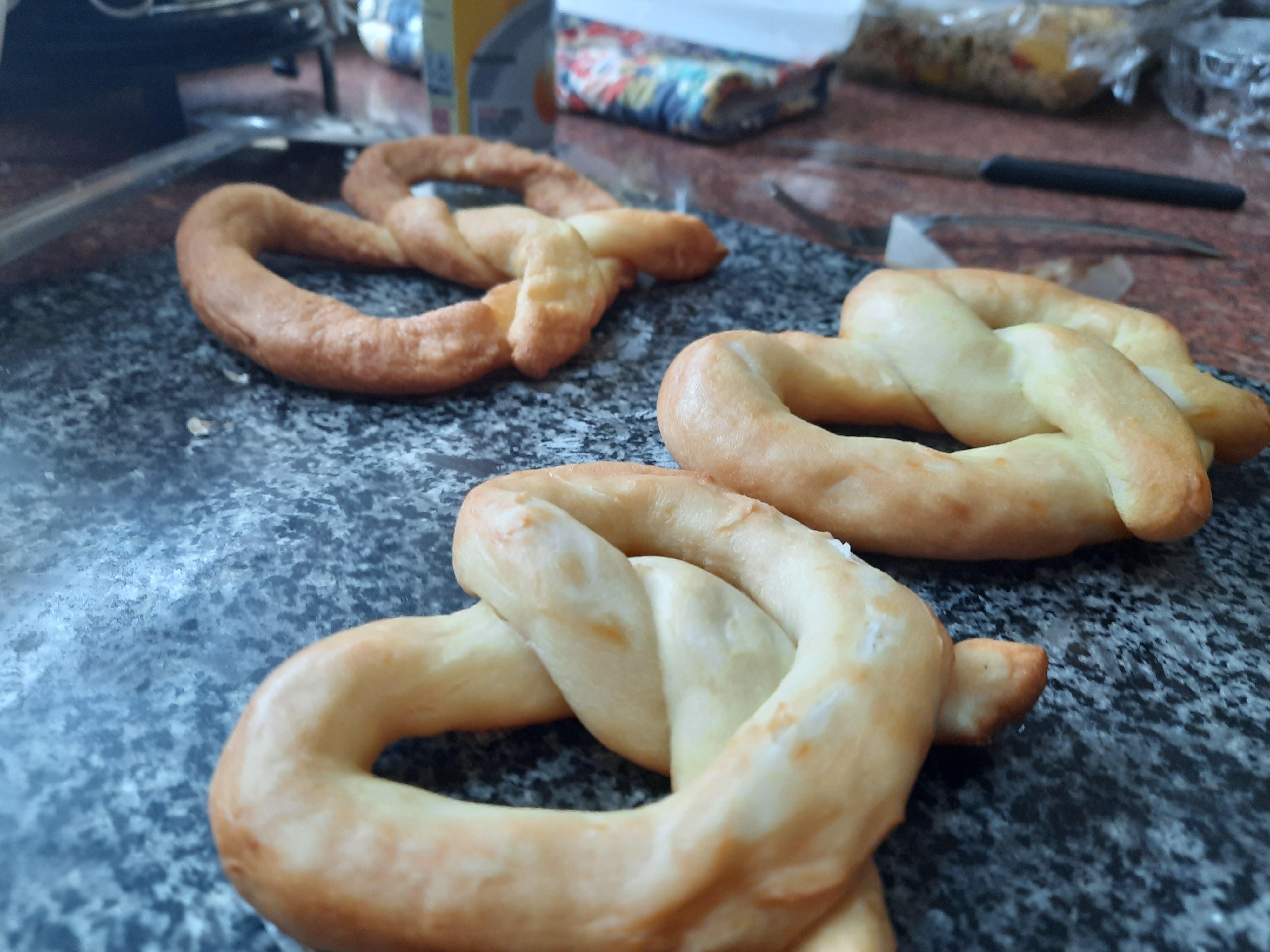 Pretzels, my first try y'all, dont look as sexy as they did in the recipe but hey r/Baking