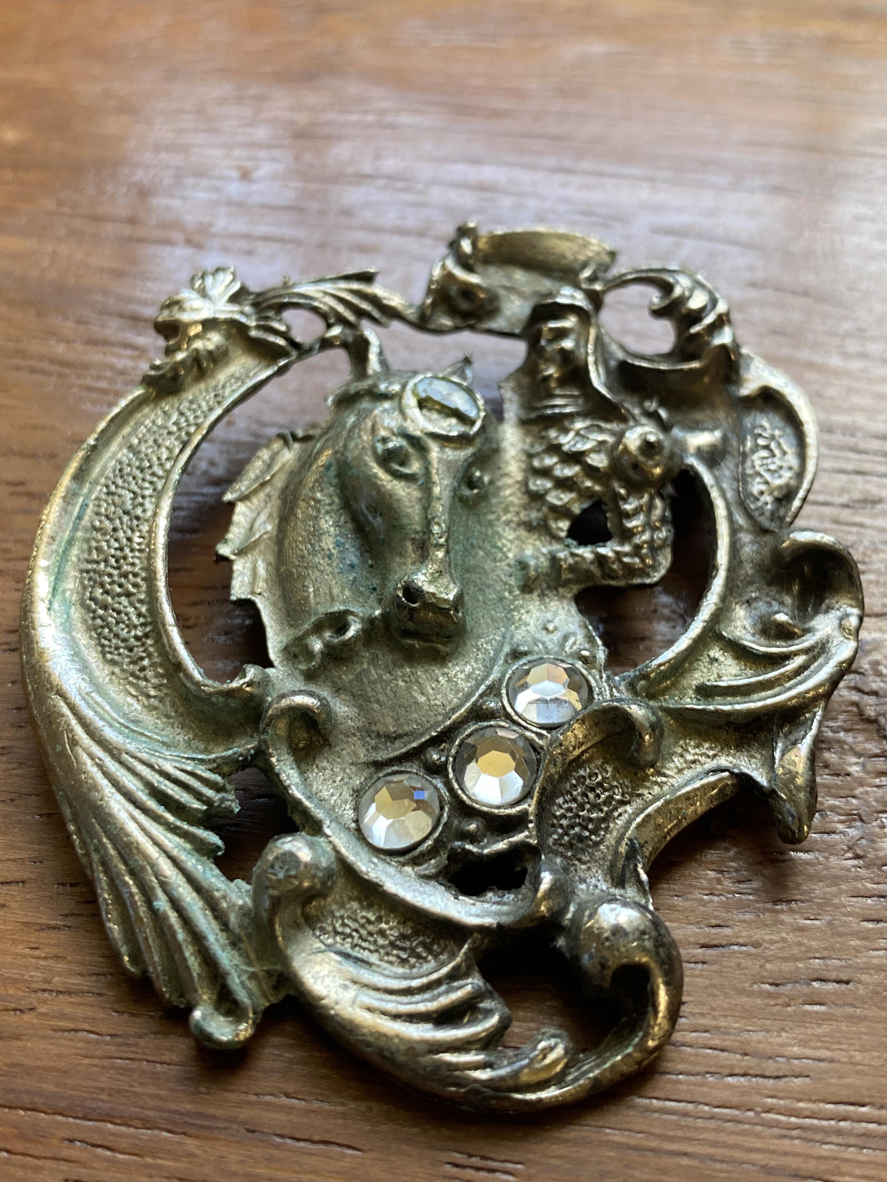 Does anyone have clue on what this Brooch is? I have in since childhood