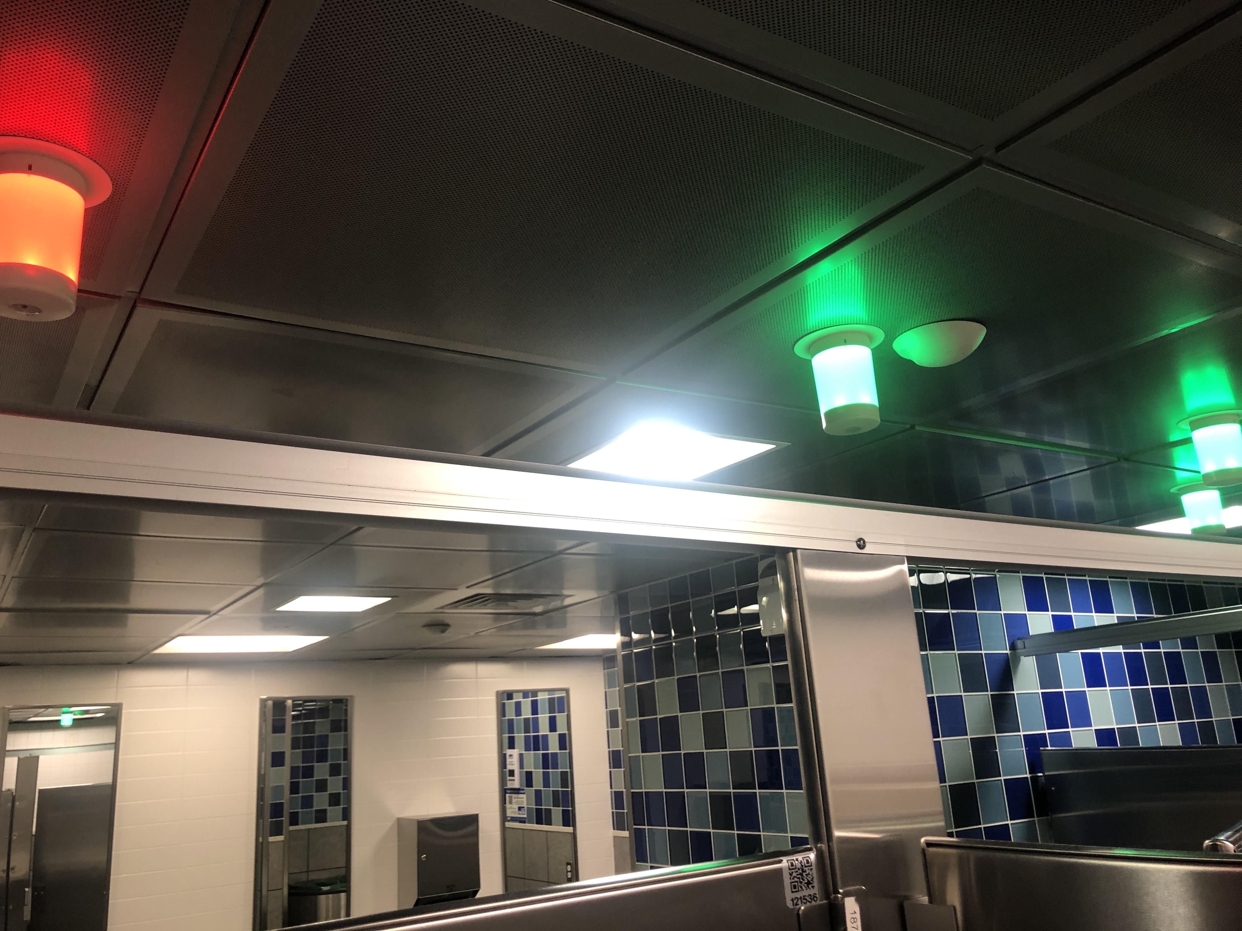 The way this bathroom shows whether stalls are taken so you don’t have