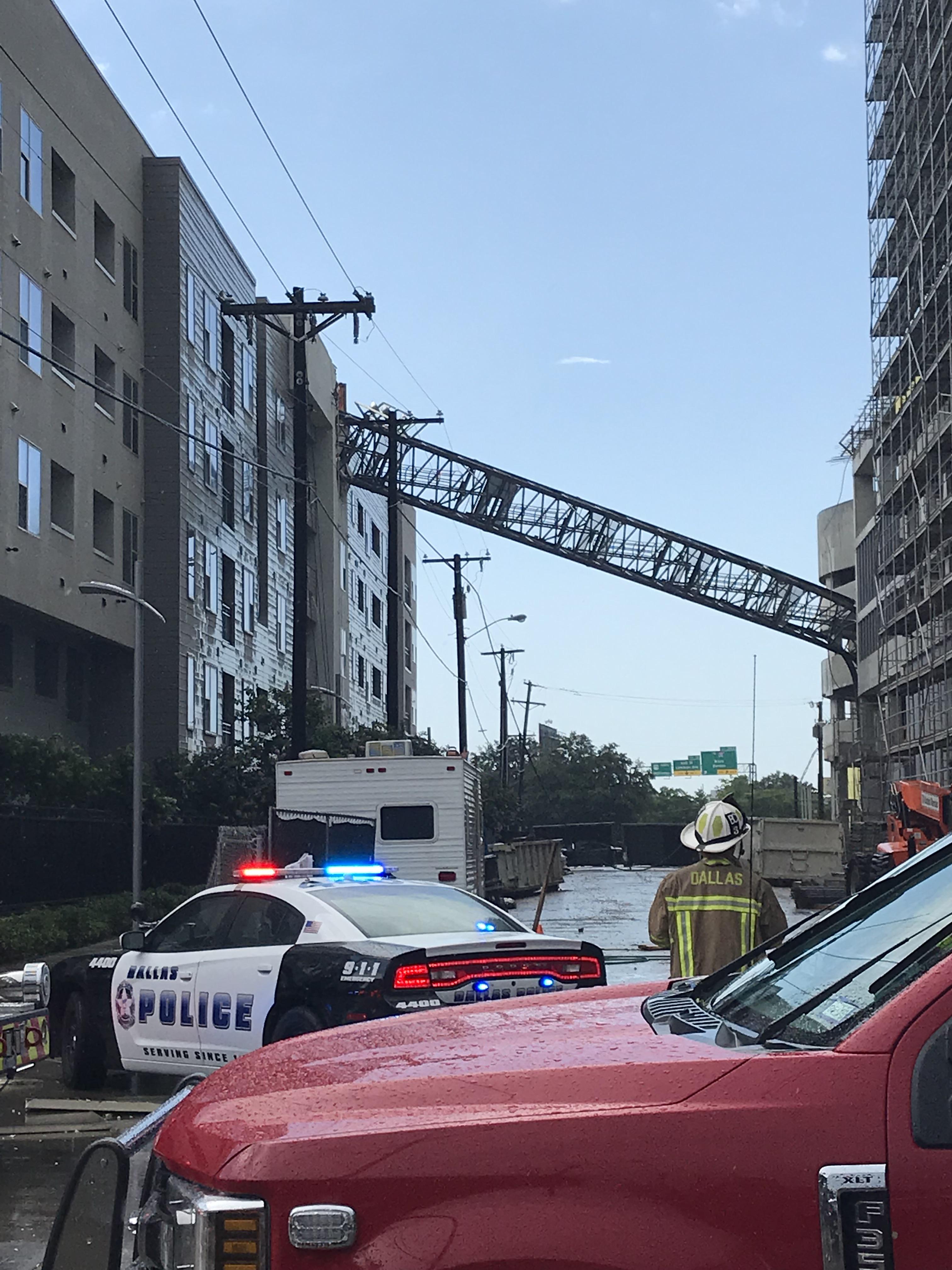 Crane falls into apartment complex after crane company has multiple