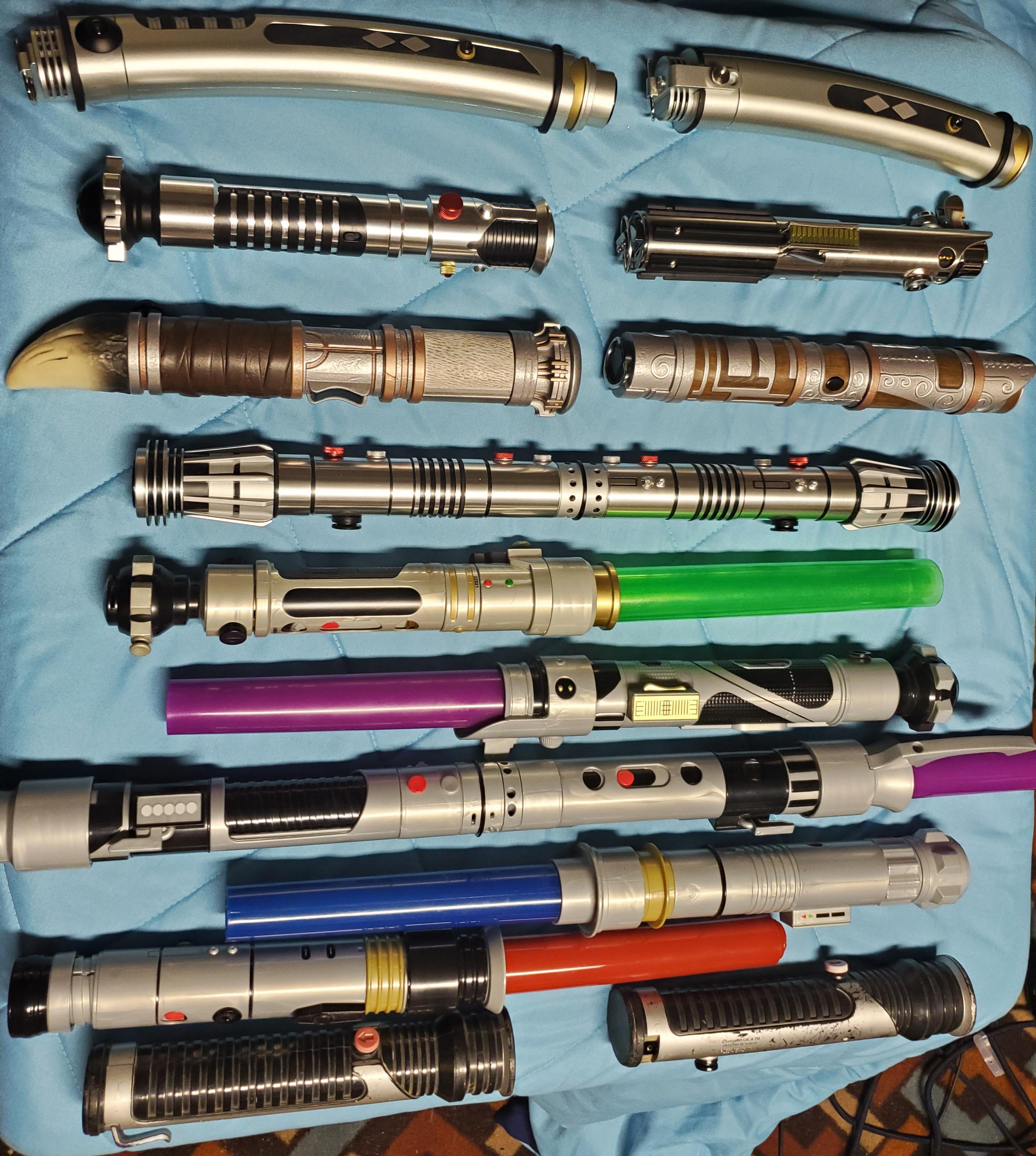My Lightsaber collection so far. r/StarWars