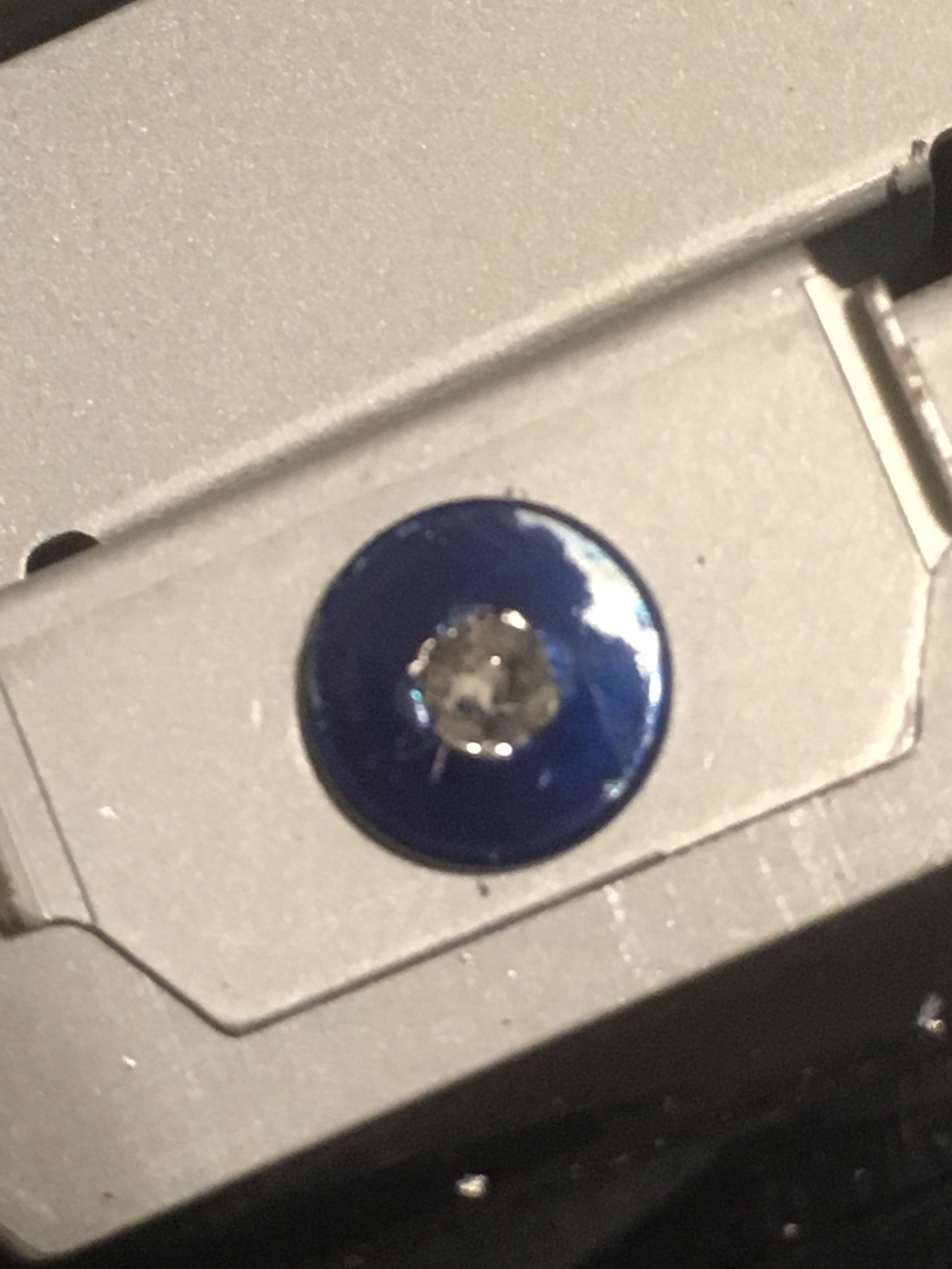 Help! How can I get this hard drive screw out of this 40gb? It’s
