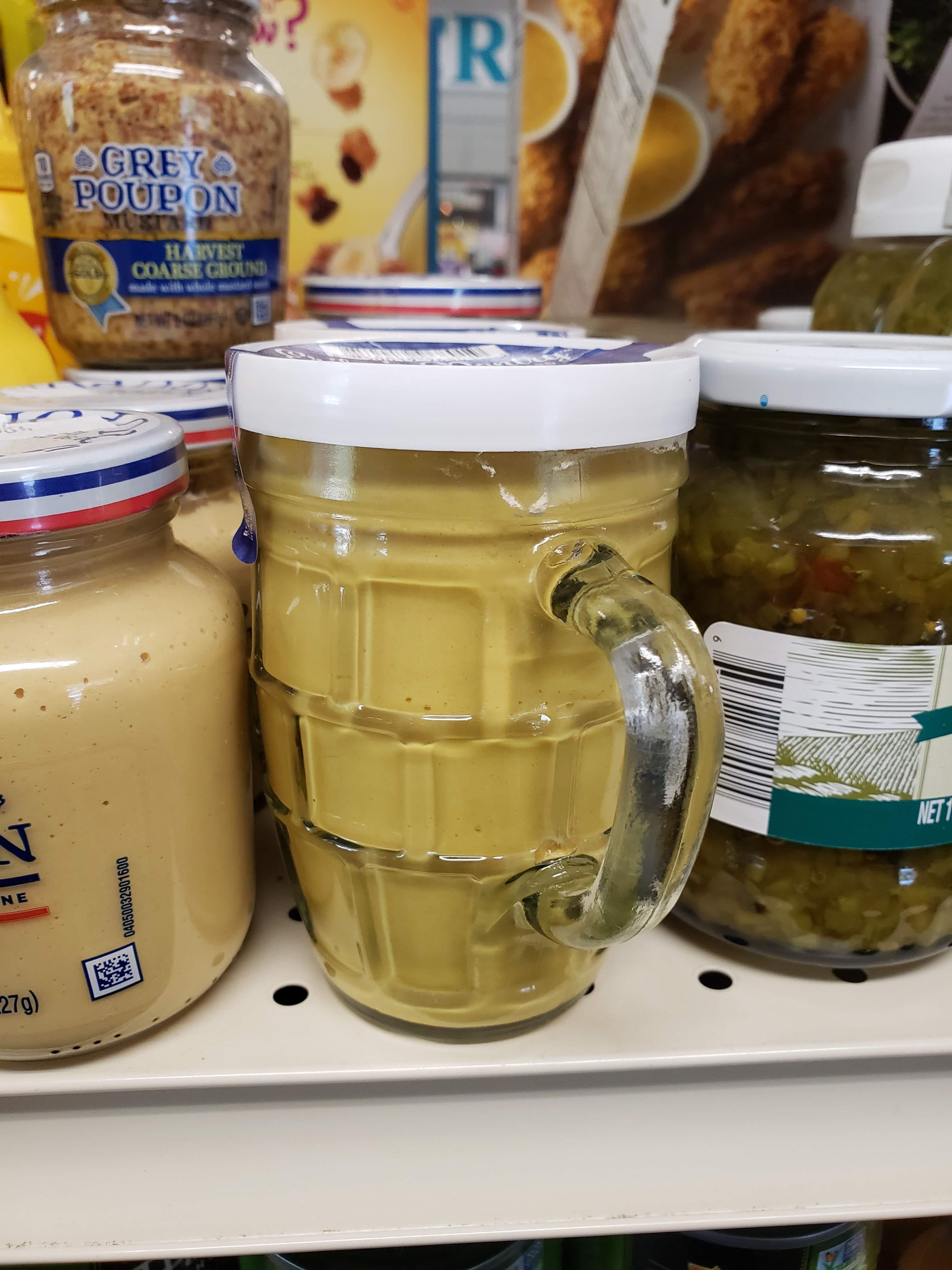 This jar of mustard has a handle, so that after you finish the mustard