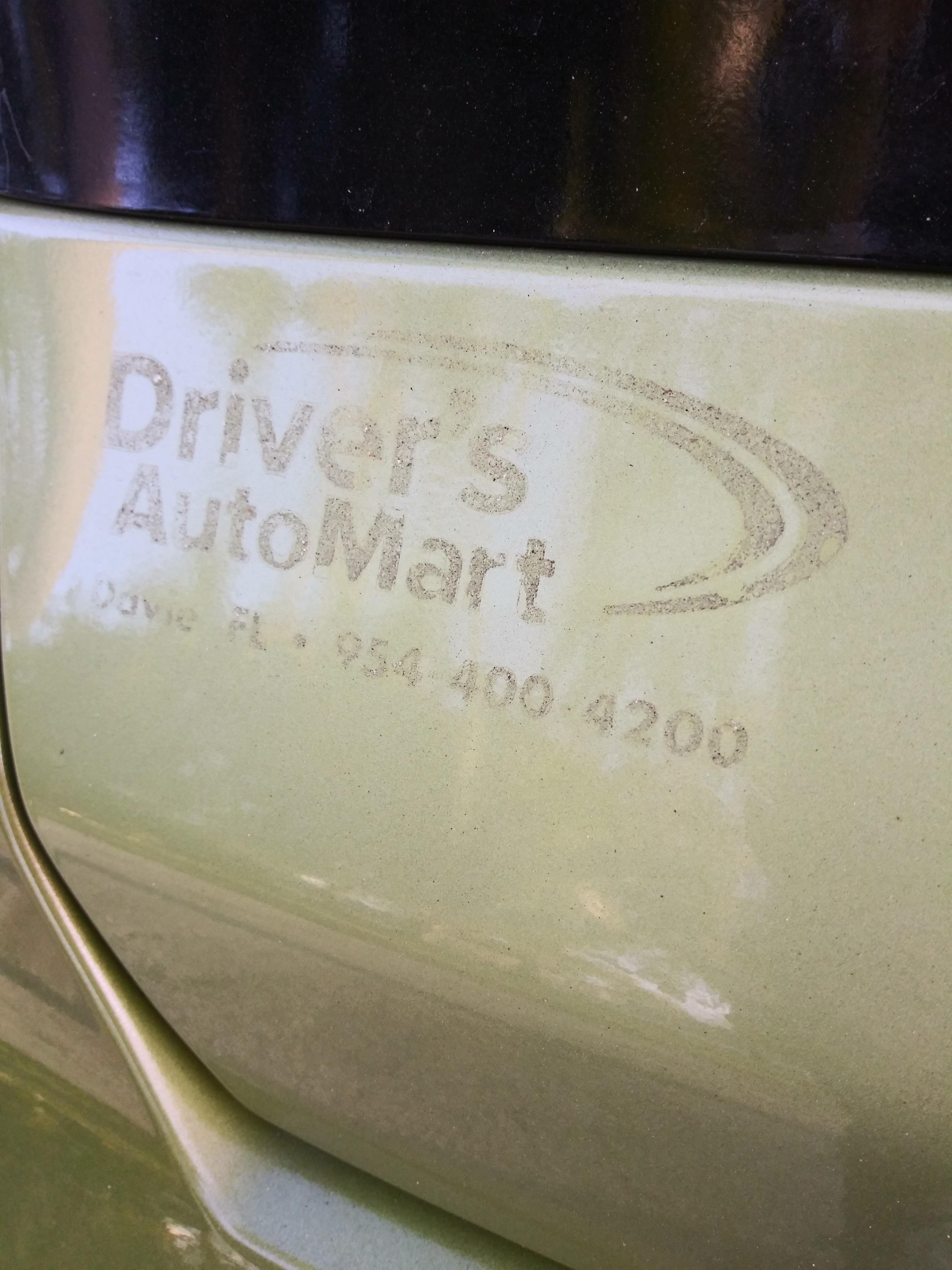 What can I use to get the glue and dirt logo off my car without