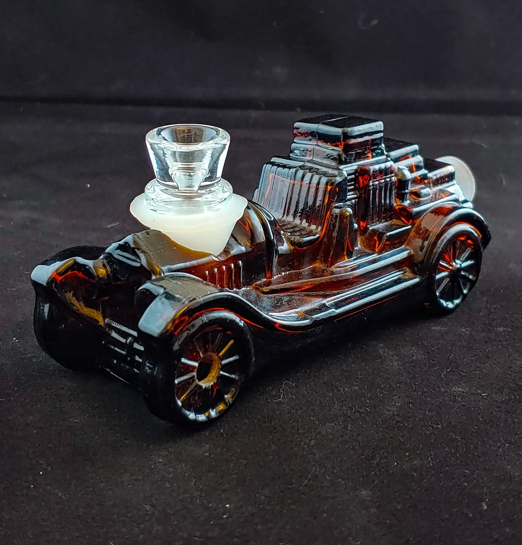 I found a bunch of these old carshaped Avon after shave bottles made with pressed glass and I