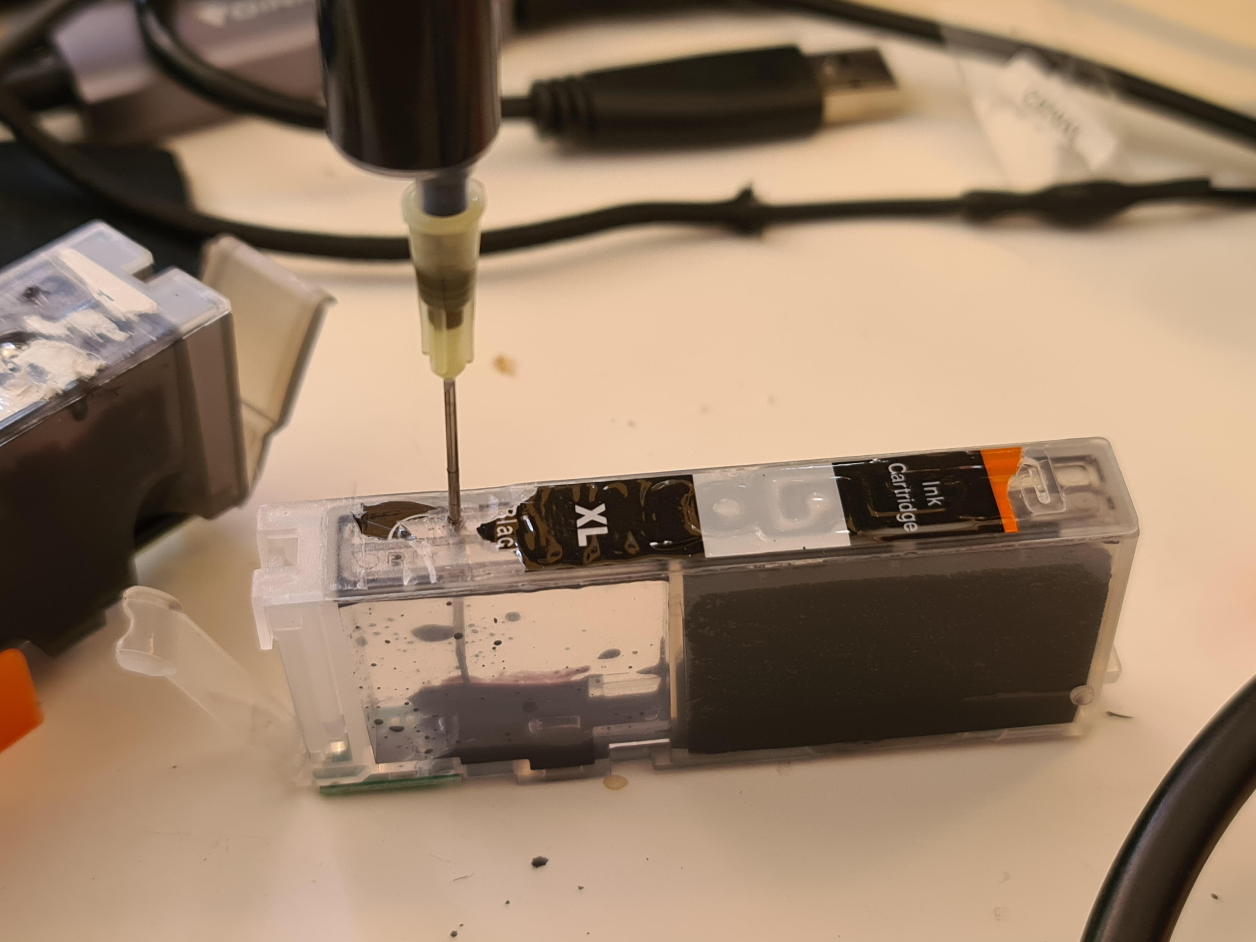 When you only have the wrong printer cartridges and a syringe r