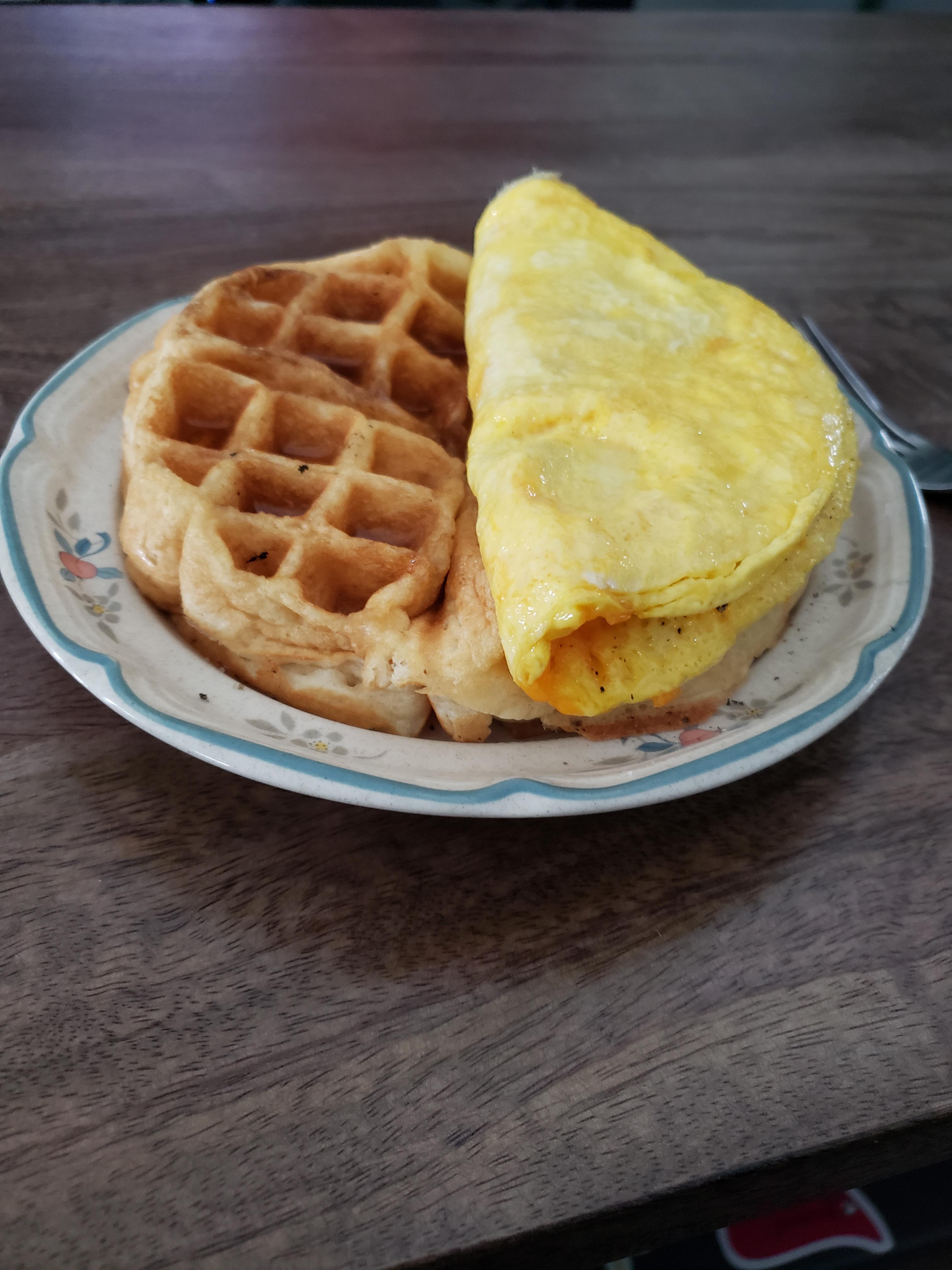 Scrambled eggs over a waffle. r/stonerfood