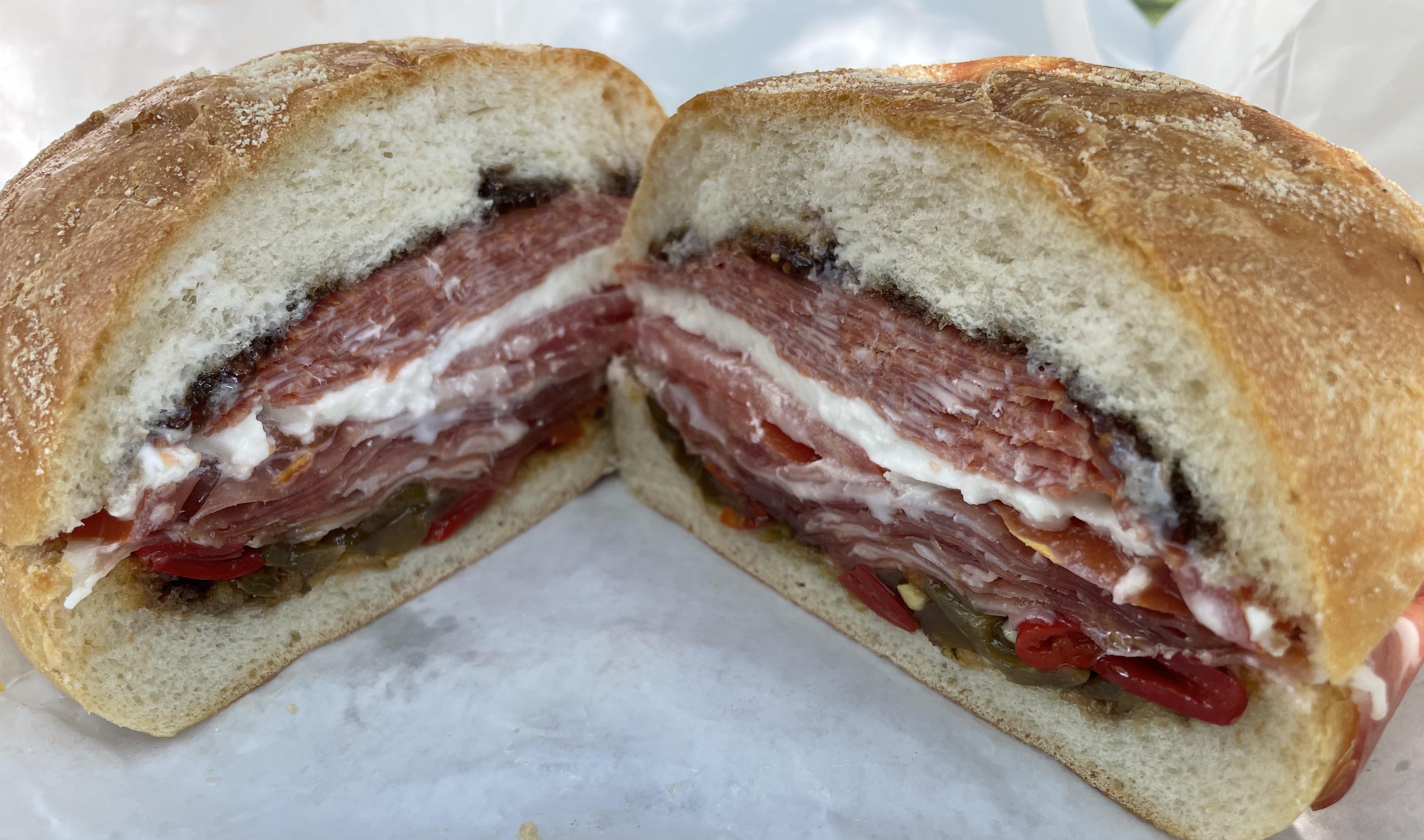 Prosciutto, Genoa salami, mozzarella, Calabrese peperoncini and fig jam. La Salumeria, Toronto