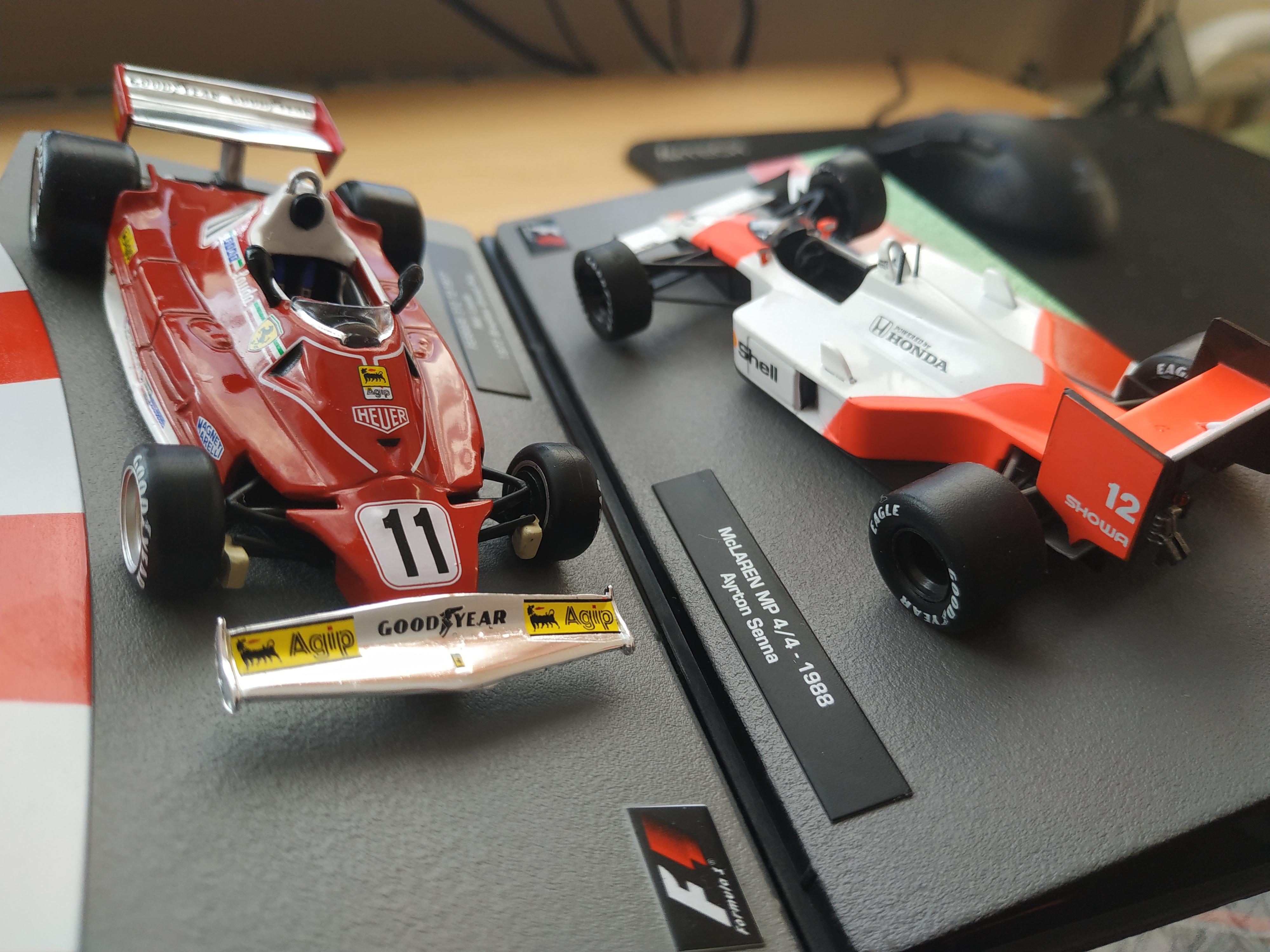 Two F1 models that come with an official F1 collectible magazine