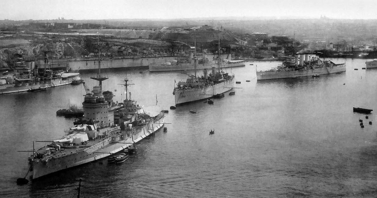 HMS Warspite with another Queen Elizabethclass behind her, two County