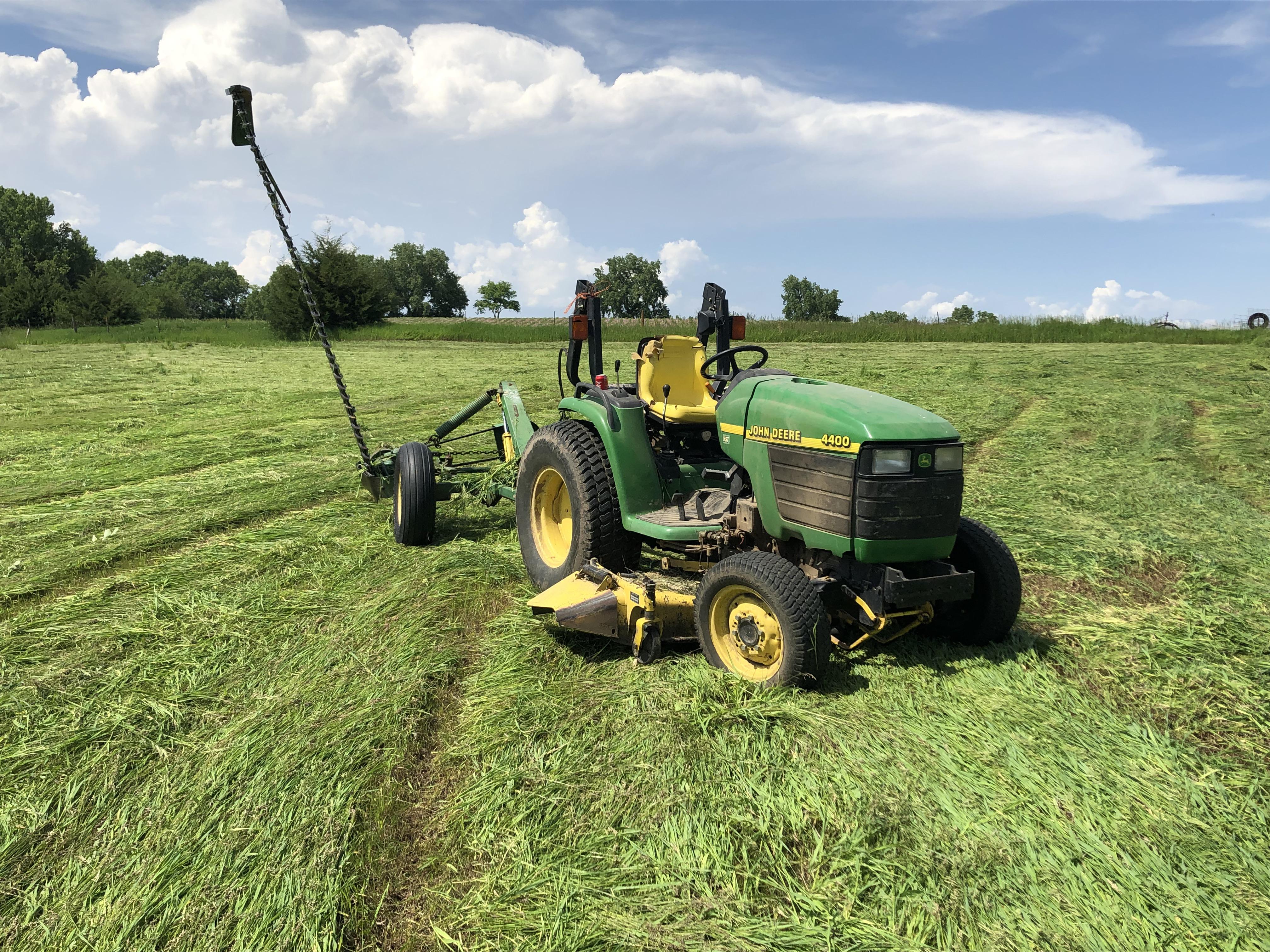 The 4010 broke down cutting hay. The lawn mower comes to the rescue