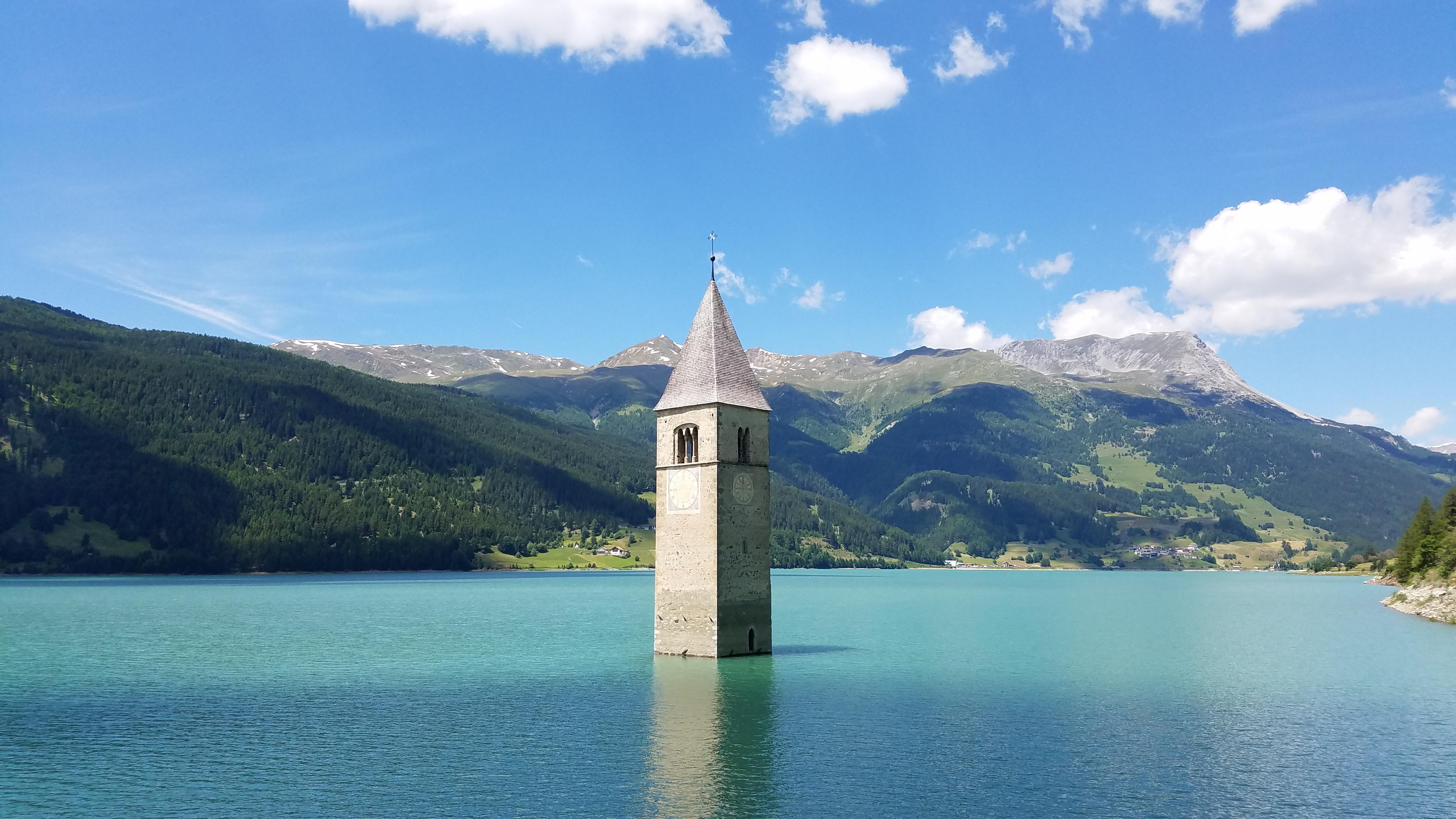 The bell tower at (in) Reschensee, South Tyrol, Italy. 08/2019. r/hiking