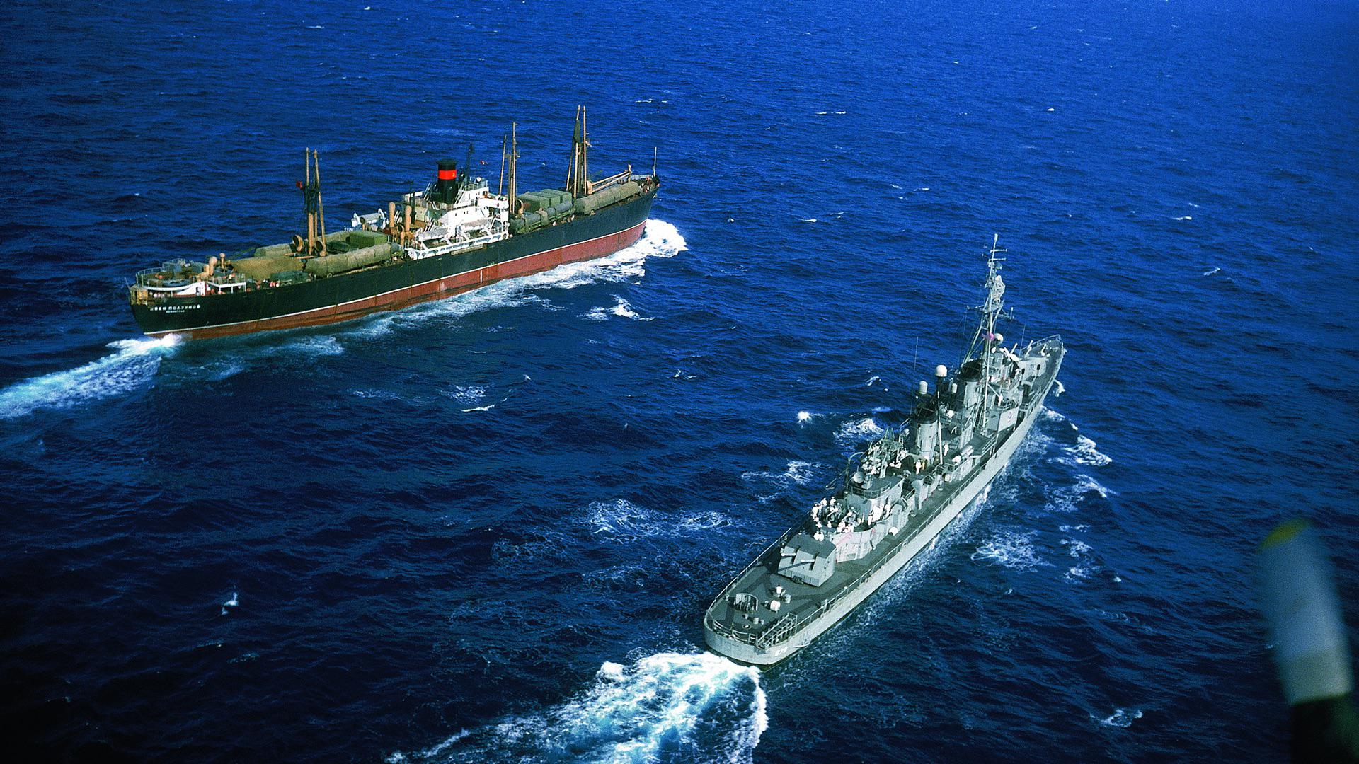 U.S. naval ship intercepts a Soviet freighter bound for Cuba during the
