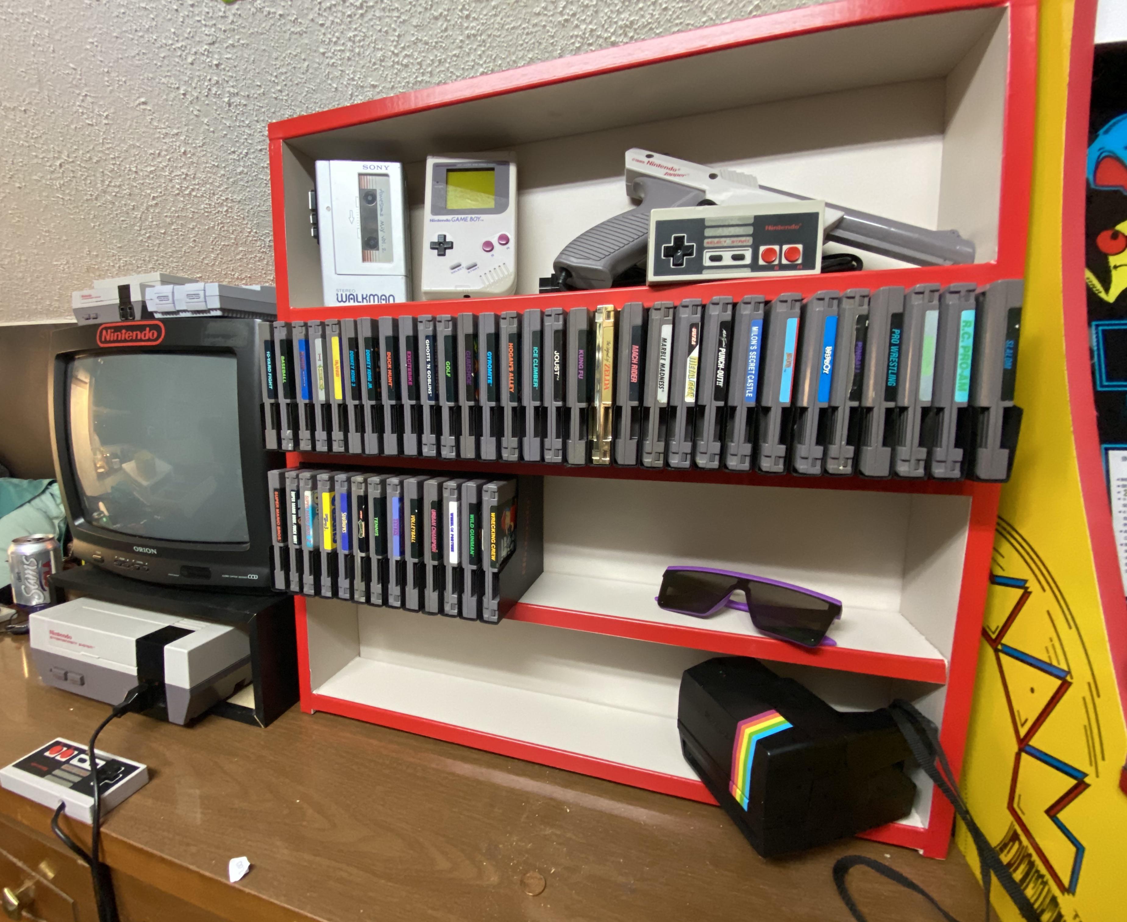 Here’s a really cool NES shelf I built! Holds over 90 games and even