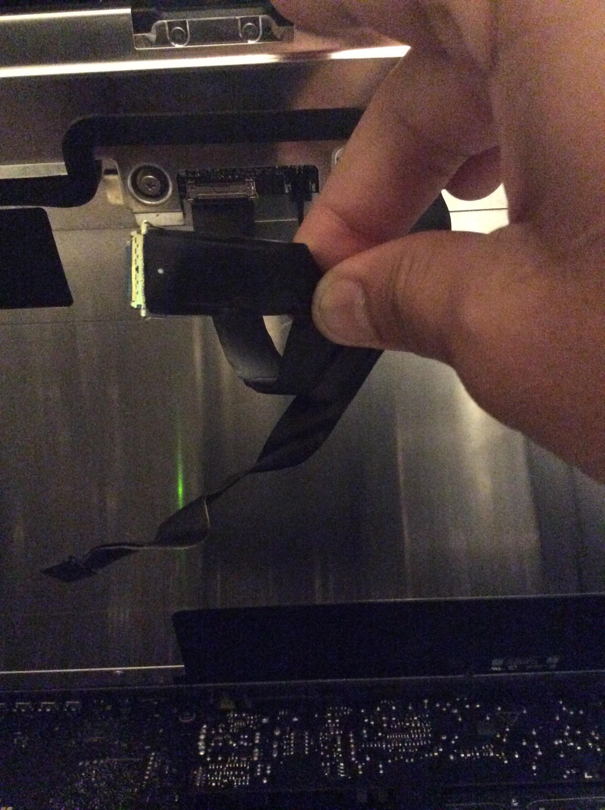 Does anyone know what this black strip that connects my iMac screen is