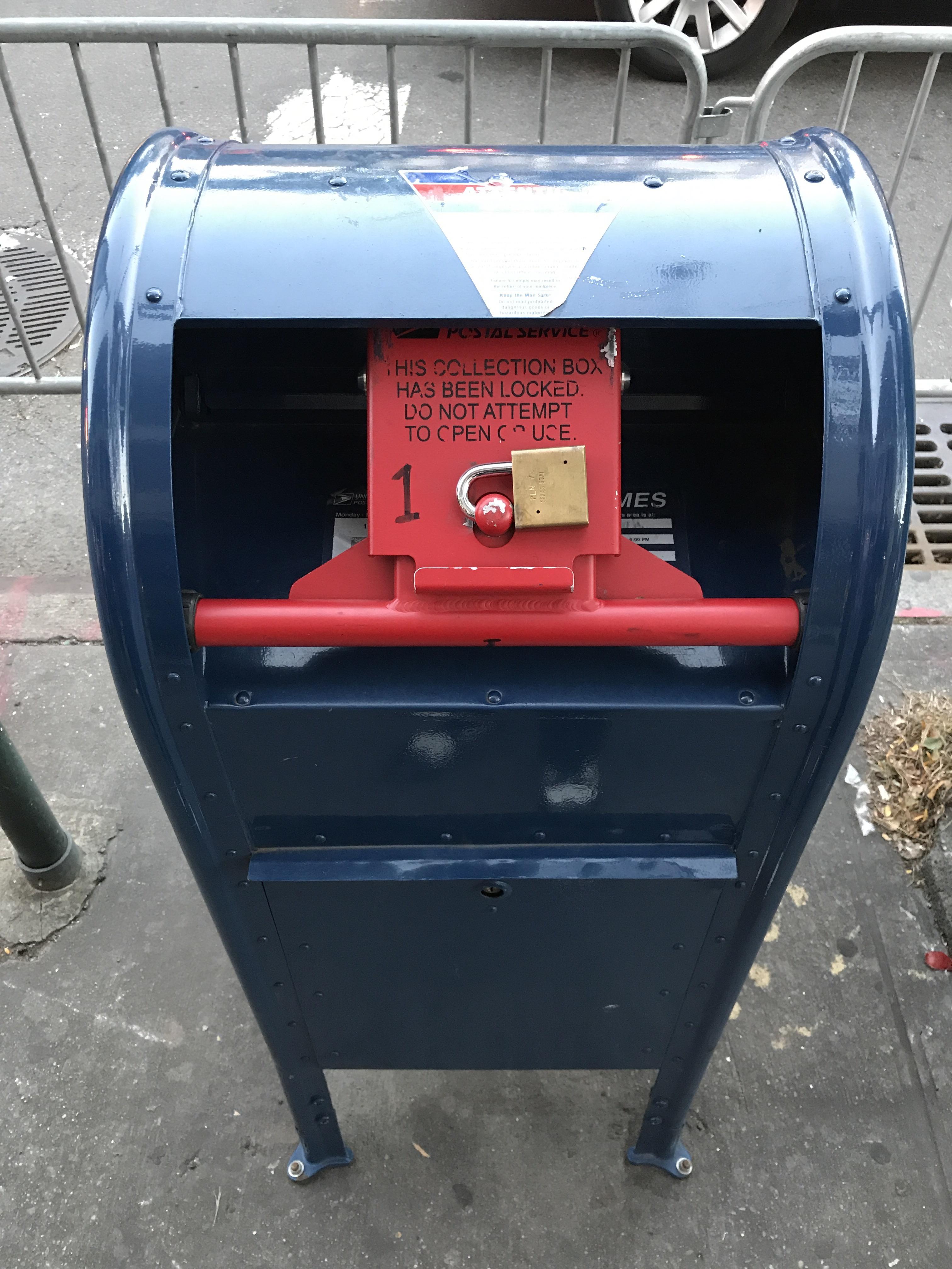 This USPS post box with a special lock because of a parade. : r