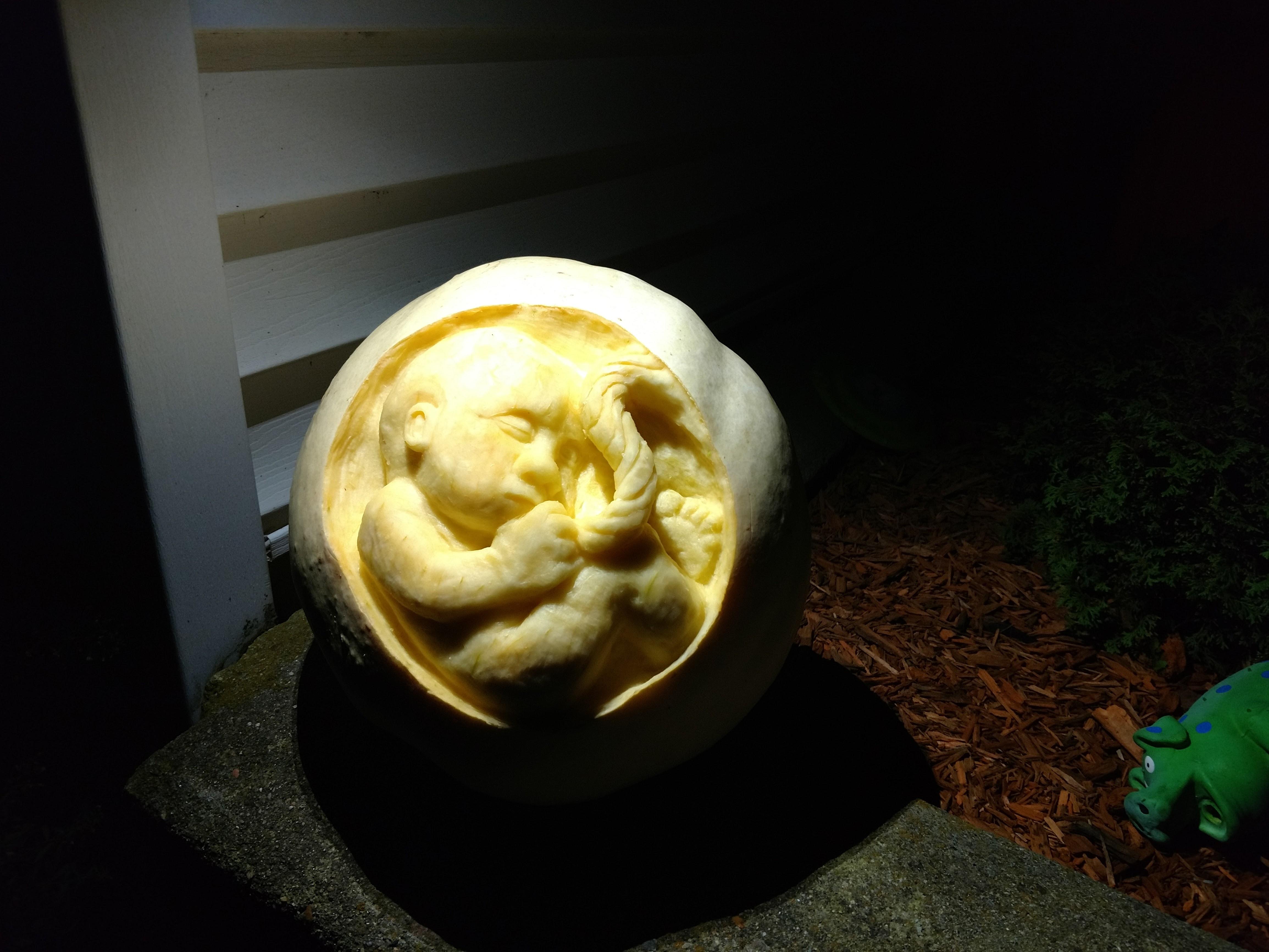 I carved this pumpkin today to announce that we are expecting our third