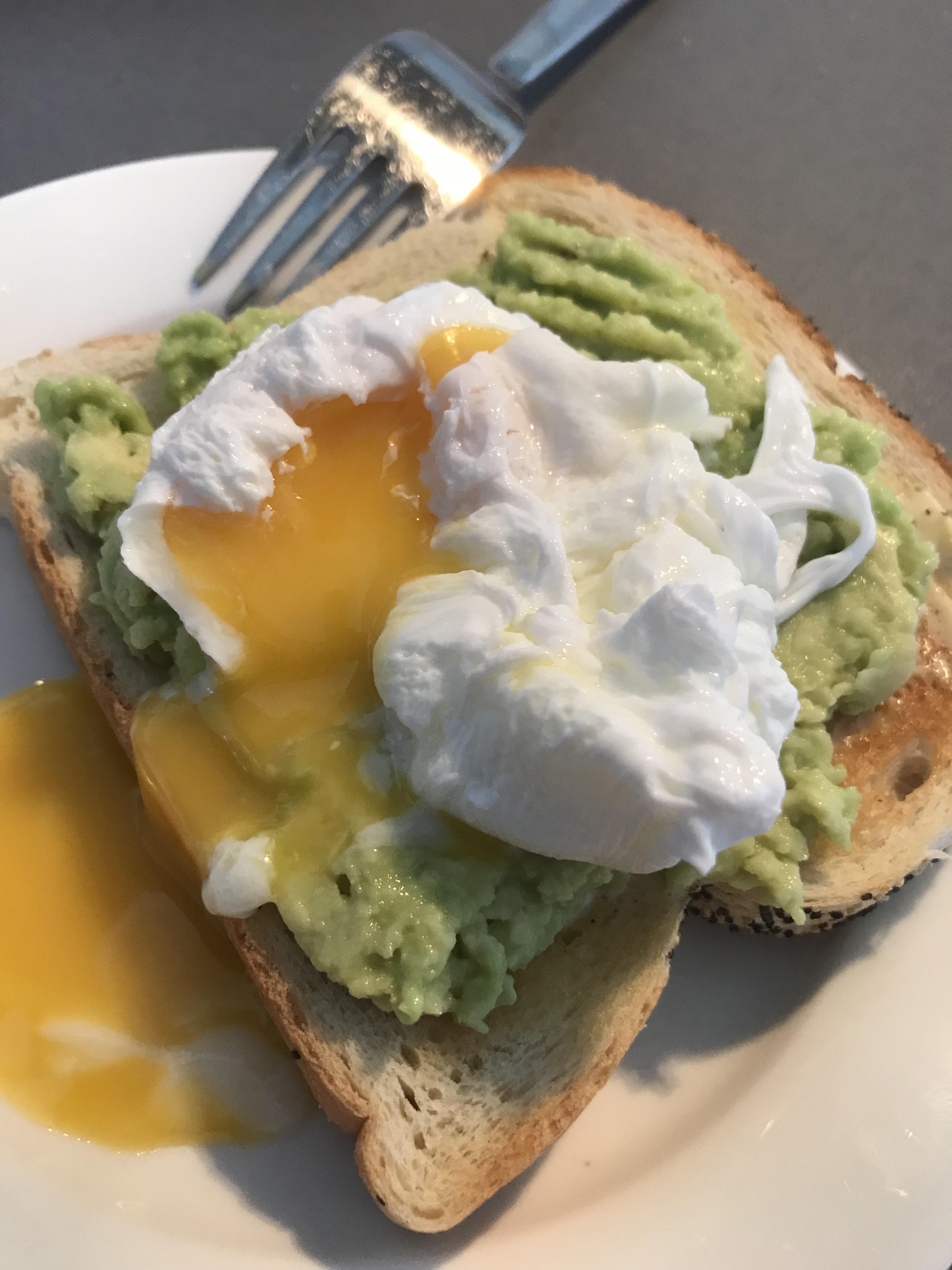First time trying a poached egg on toast. Delicious. r/PutAnEggOnIt