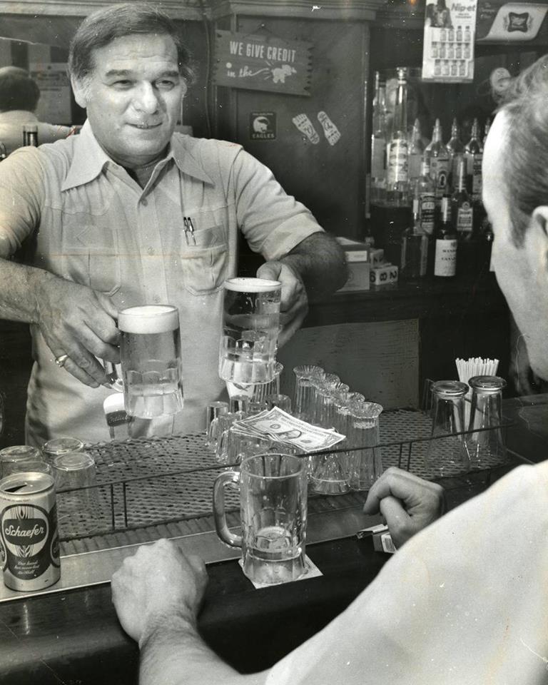 Here is Bartender Jack Meade serving up a couple of cold brews at the