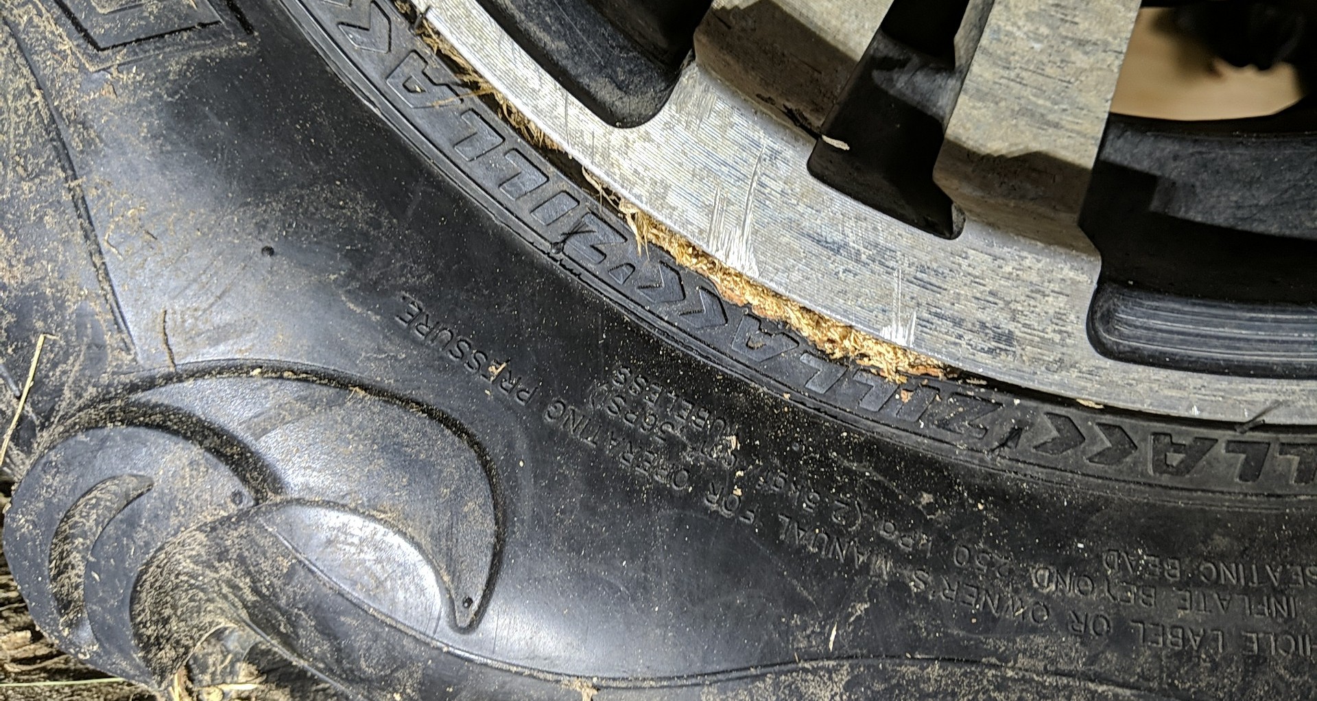 wood stuck between tire and mag r/ATV