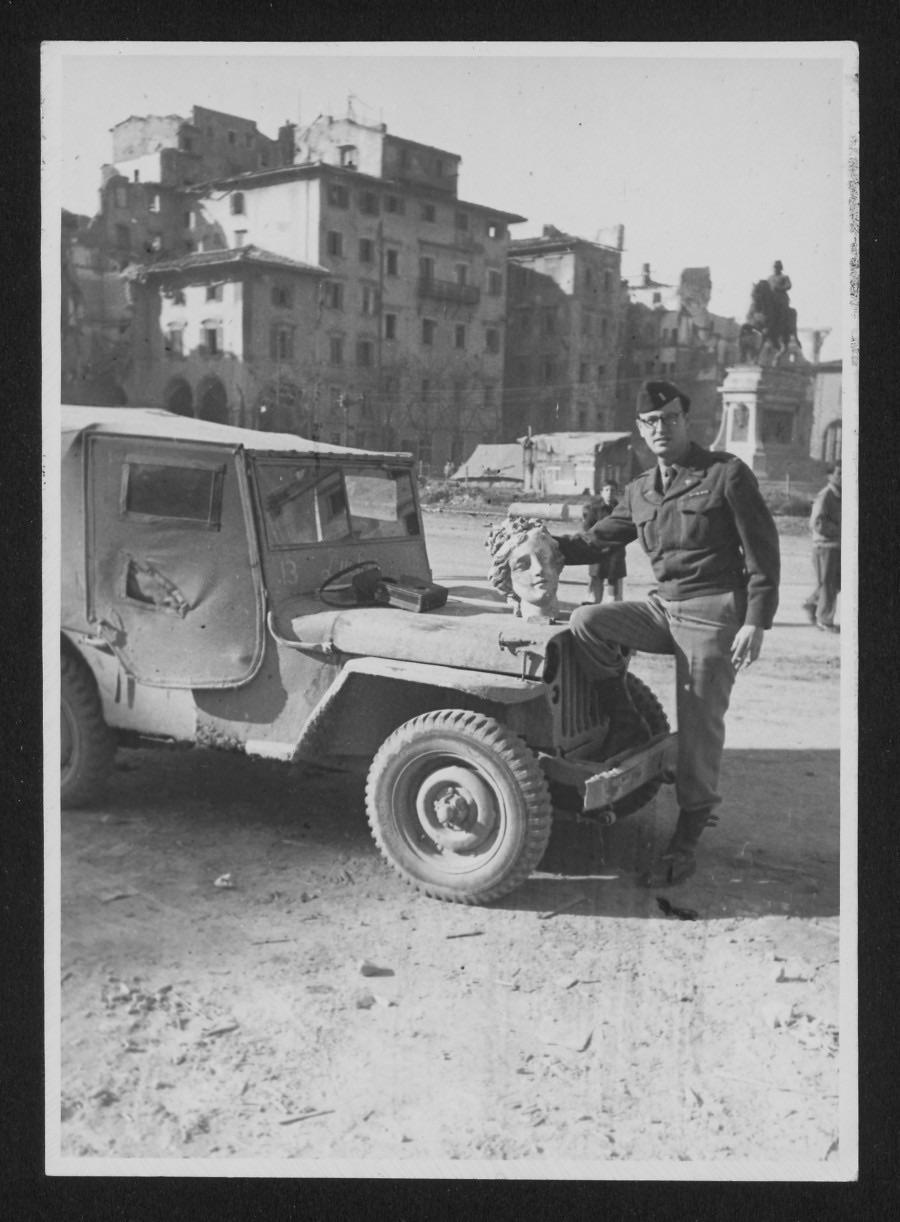 One of the real Monuments Men posing with a priceless WWII treasure