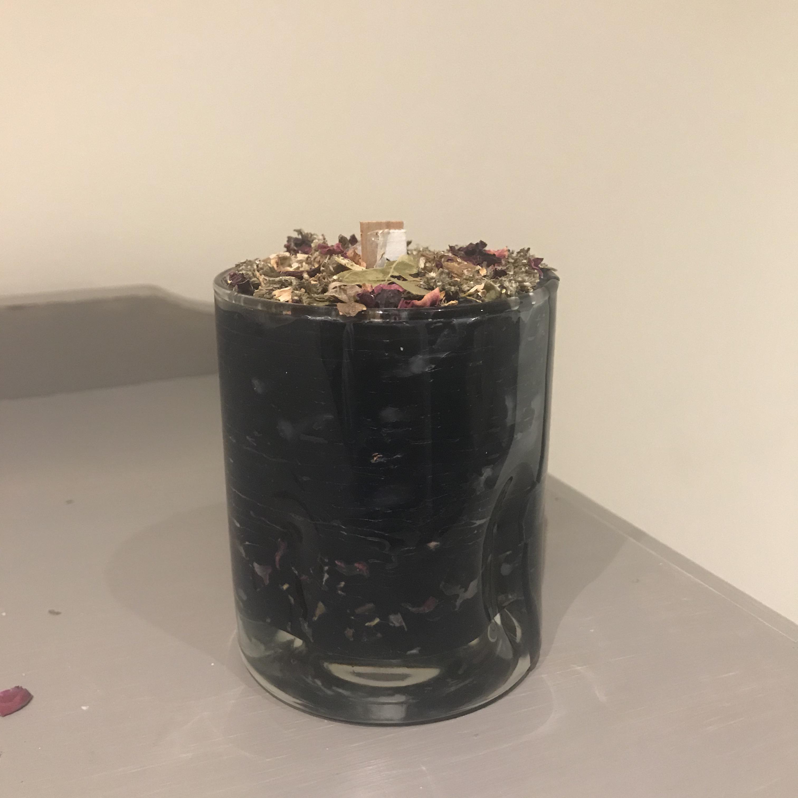 Candle for Hekate!! It is a black beeswax candle. Scents are honey