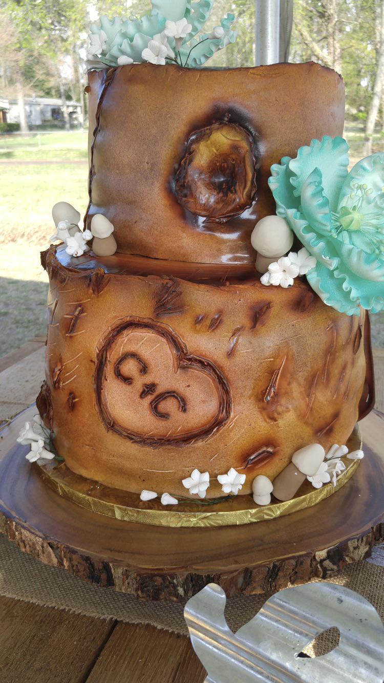 This “cattle brand” themed wedding cake that looks like a crusty