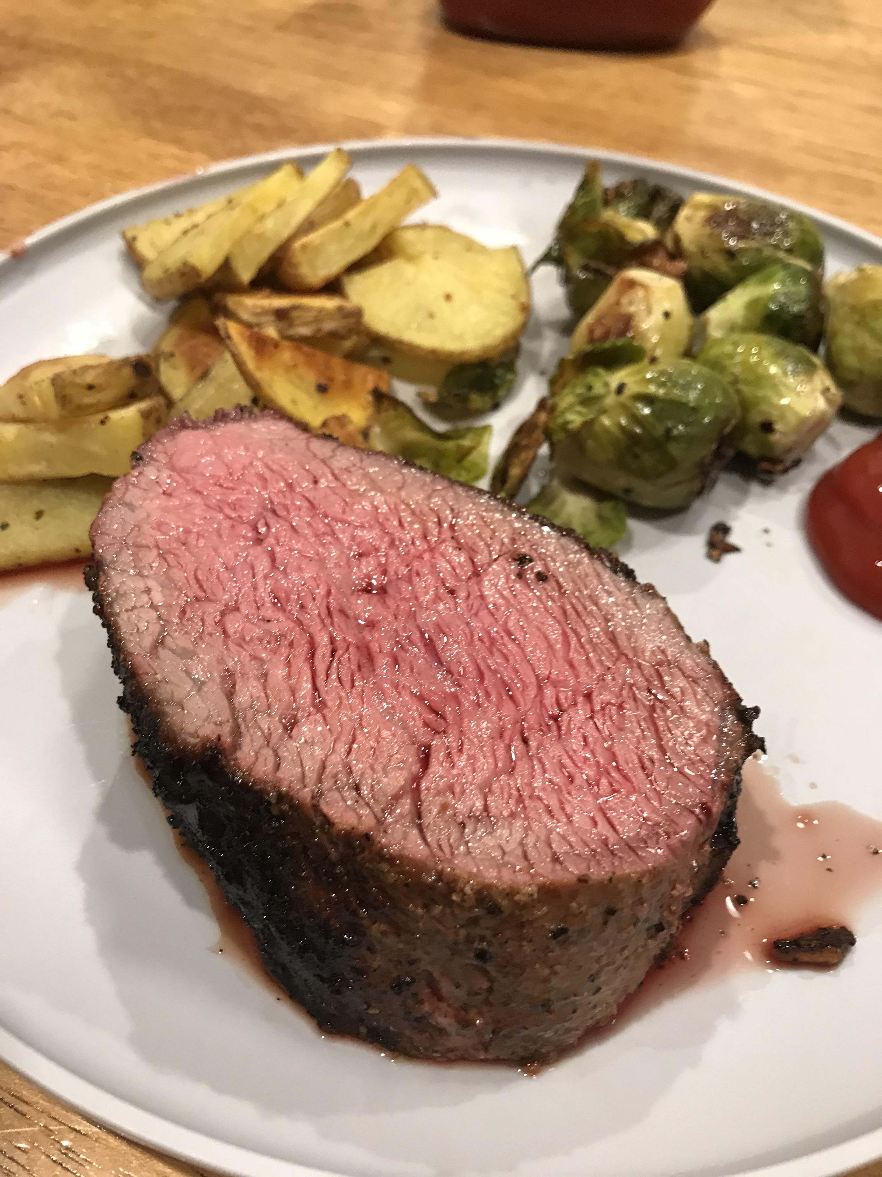 Mediumrare tri tip, with roasted Brussels sprouts and potatoes r/BBQ