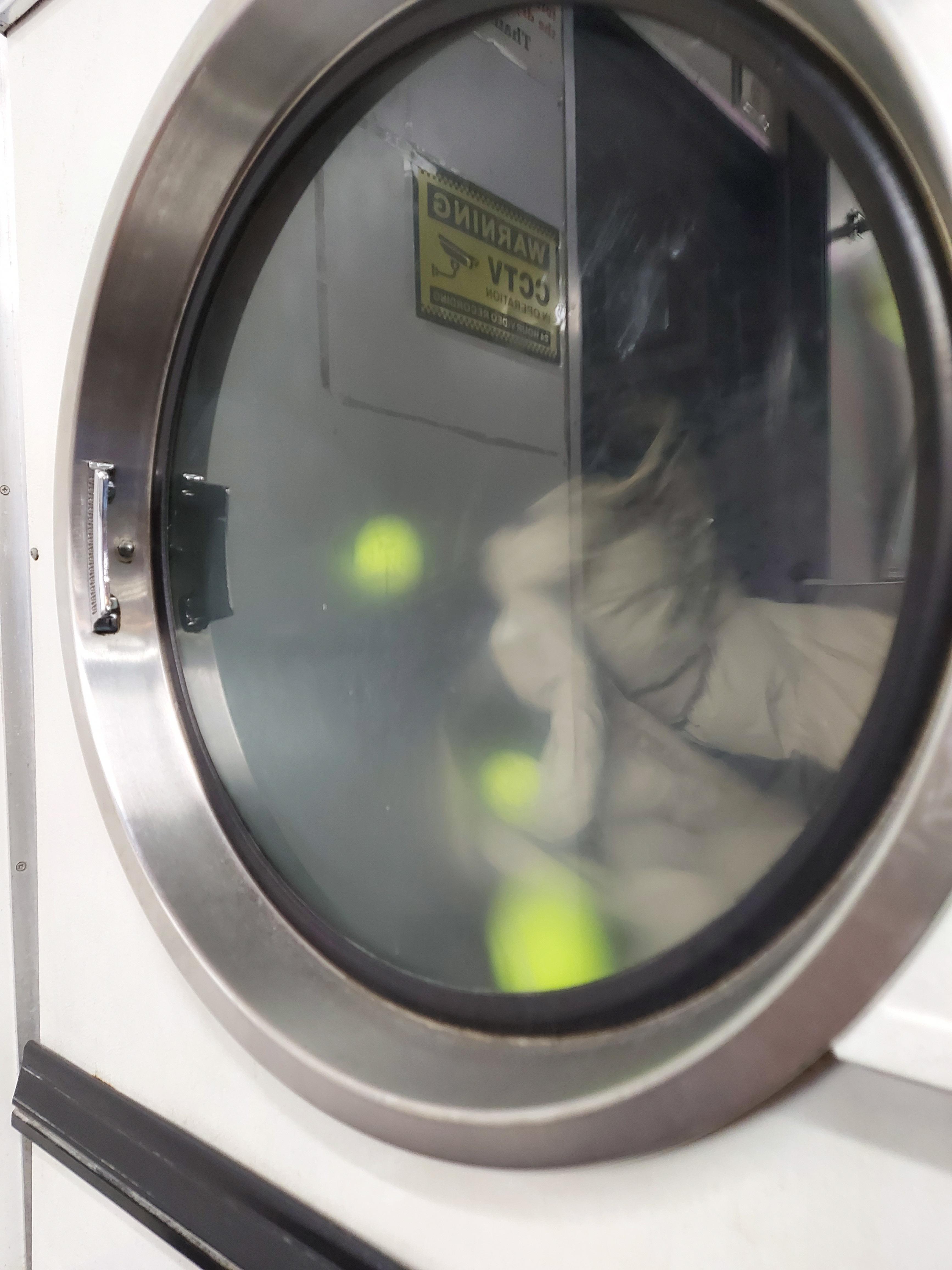 Someone at the launderette was drying tennis balls. r/mildlyinteresting