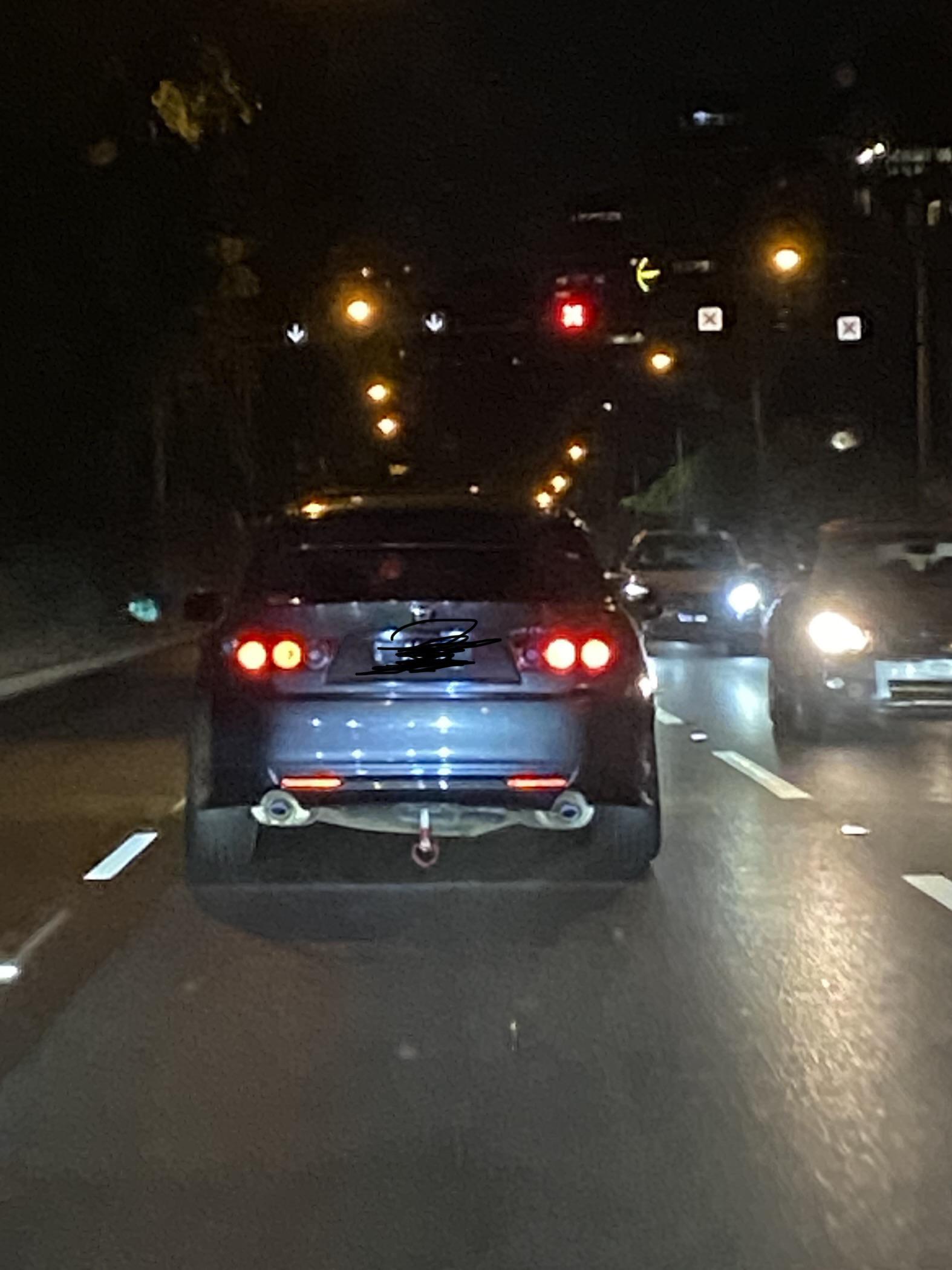 What is the red hook under the rear of the car? I just saw 2 consecutive cars to have the same