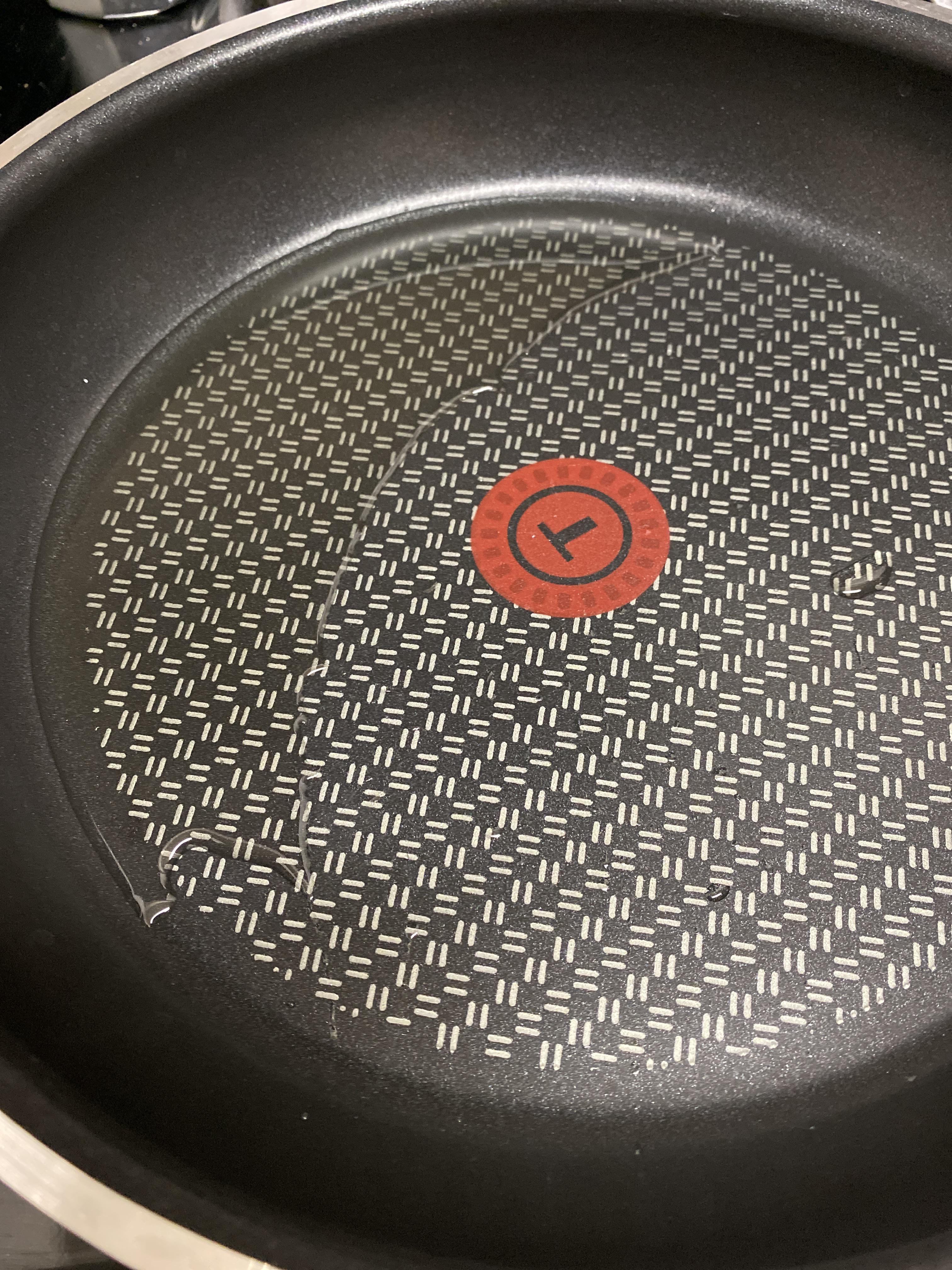 Our stove top is uneven so all the oil is moving to one side of the pan