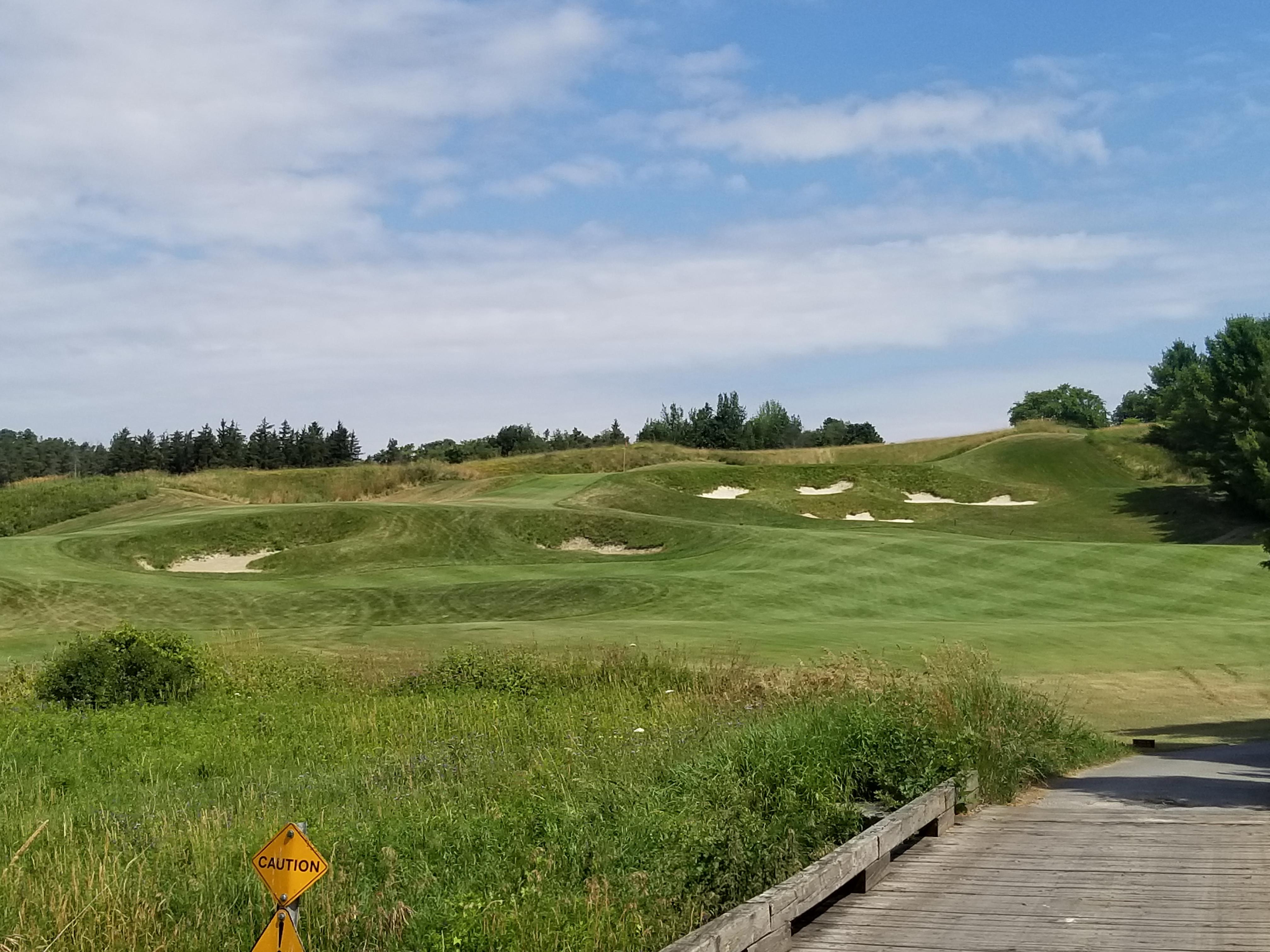 "Caution" barely begins to describe what you need for this hole. r/golf
