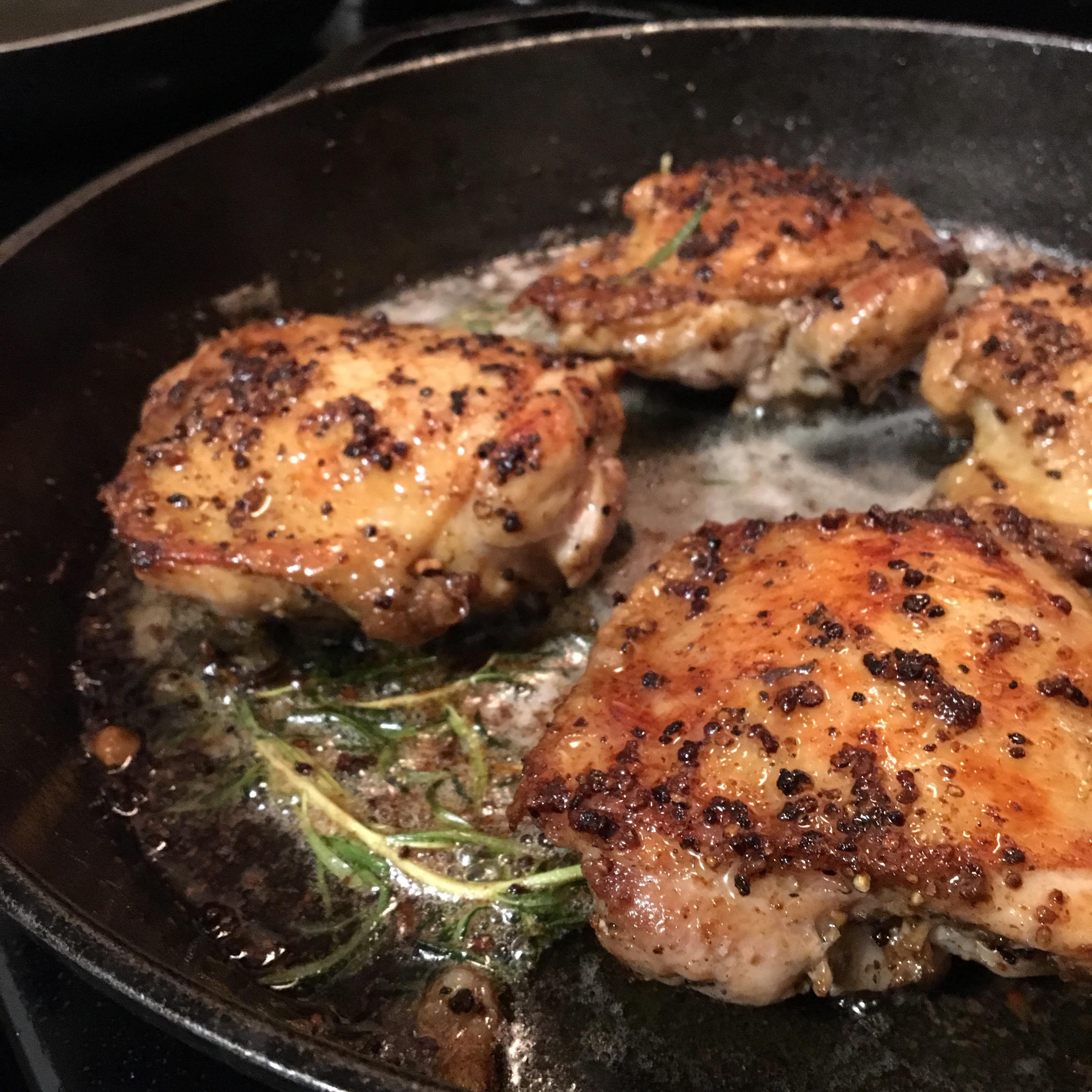 Lemon pepper buttered chicken thighs with rosemary! r/castiron