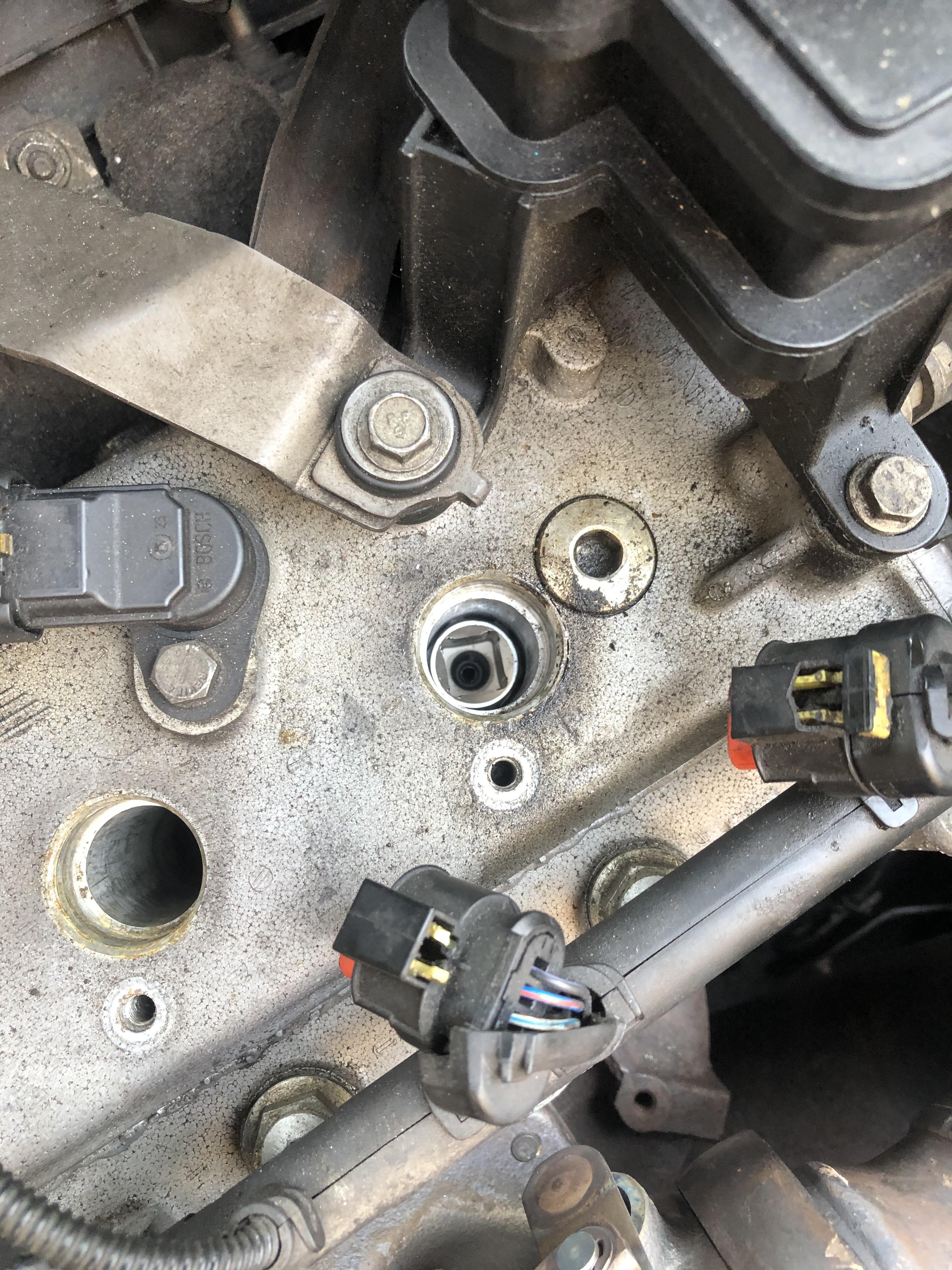 Spark plug stuck and socket is also stuck, any tips on getting it out