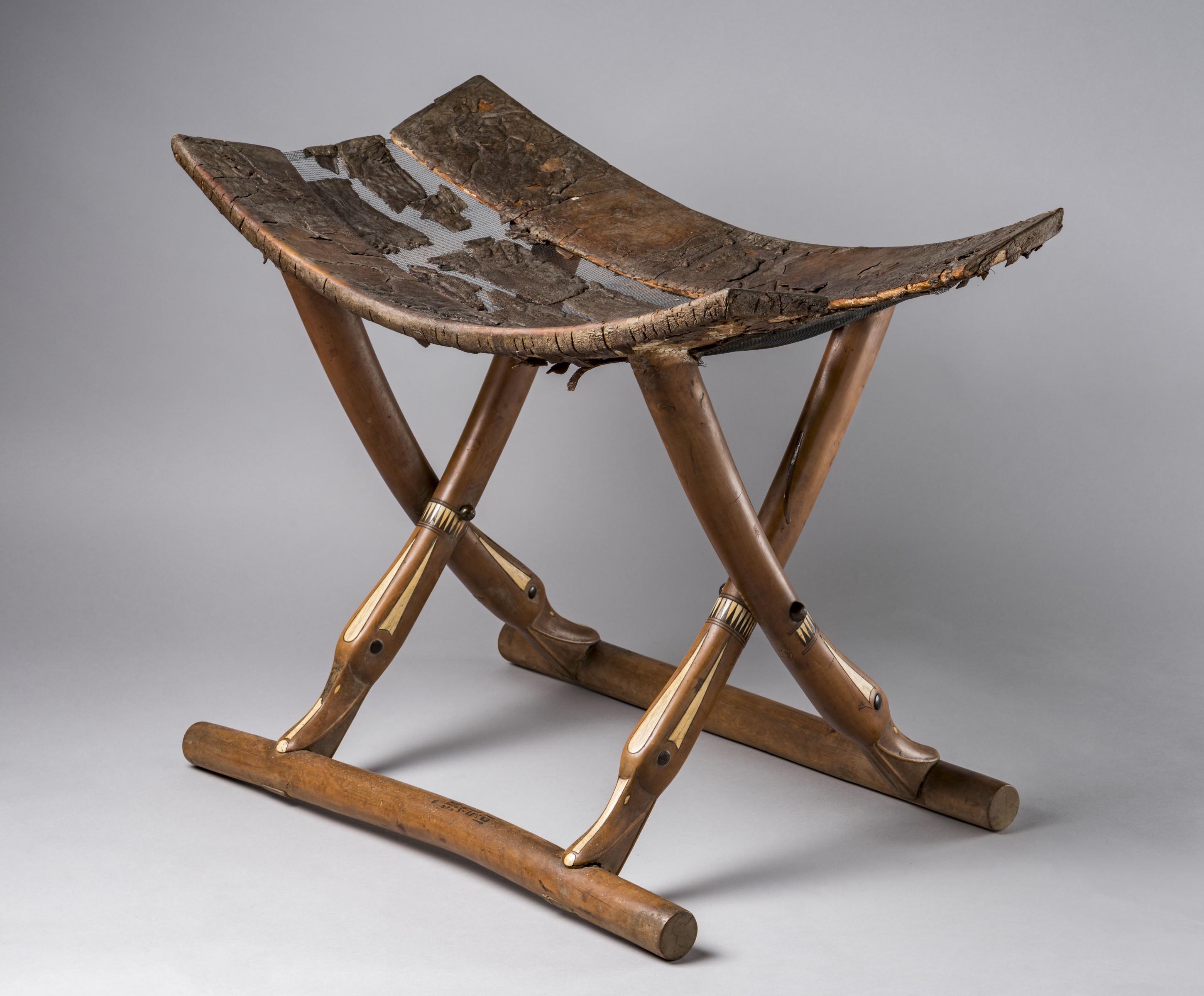 Folding stool, made of wood, ivory & leather; discovered in the Tomb of