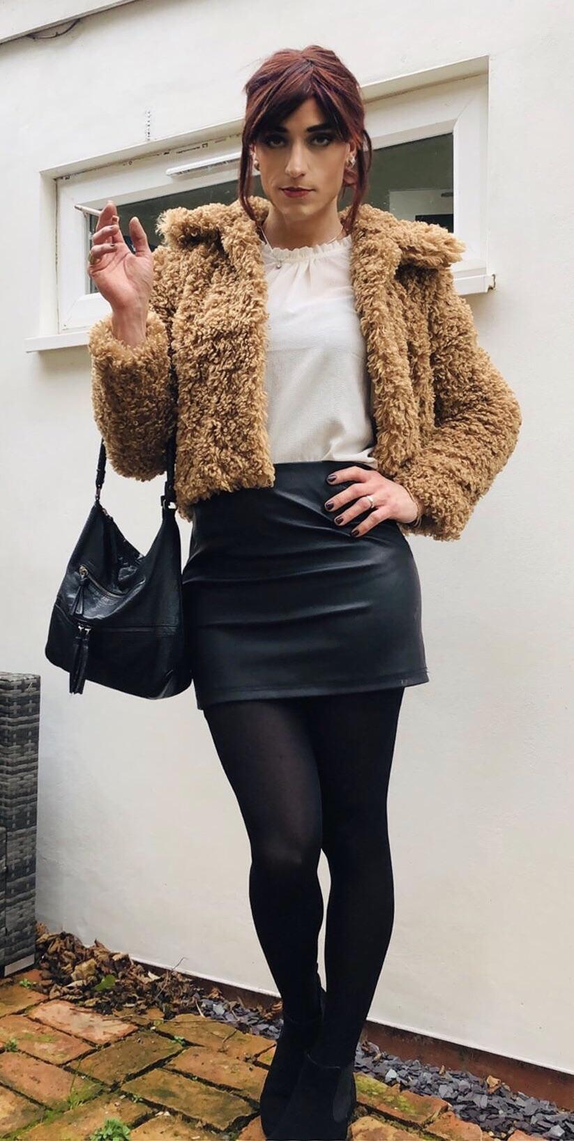 Loving this new coat, leather skirt and black tights combo with boots