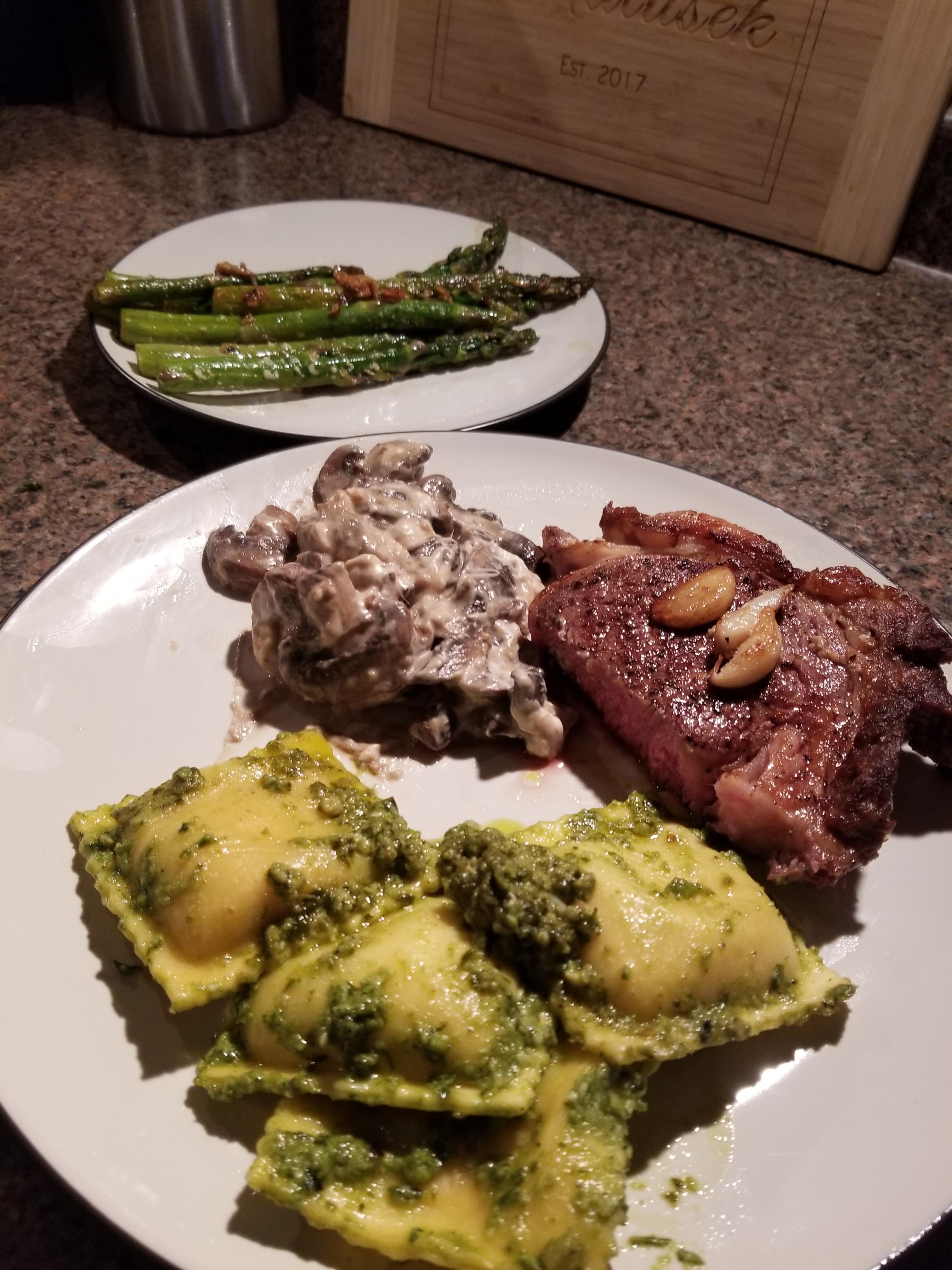Medium ribeye, crab ravioli in pesto, cheesey shrooms, & garlic lemon