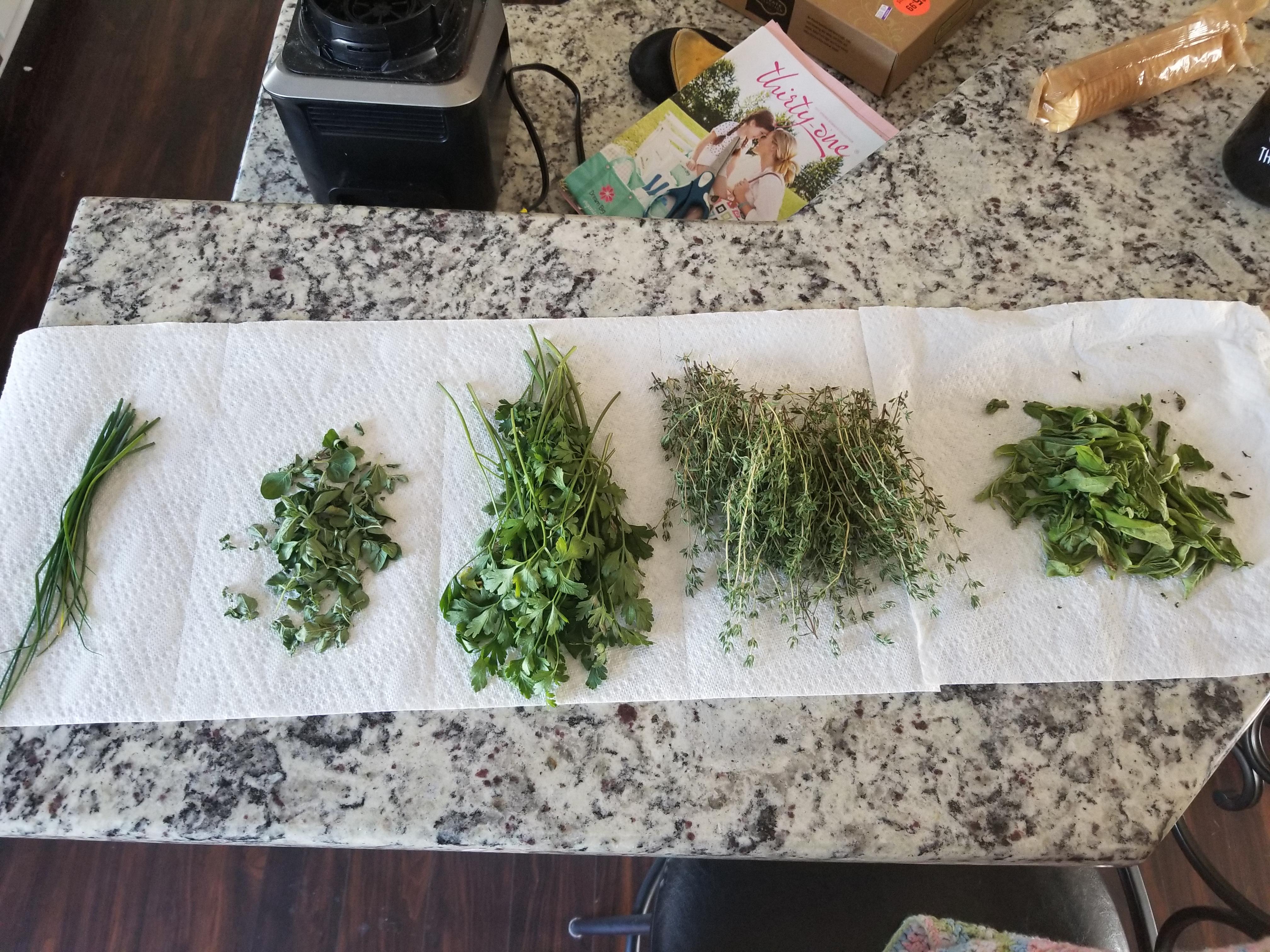 My first harvest (thyme, oregano, sage, parsley). r/gardening