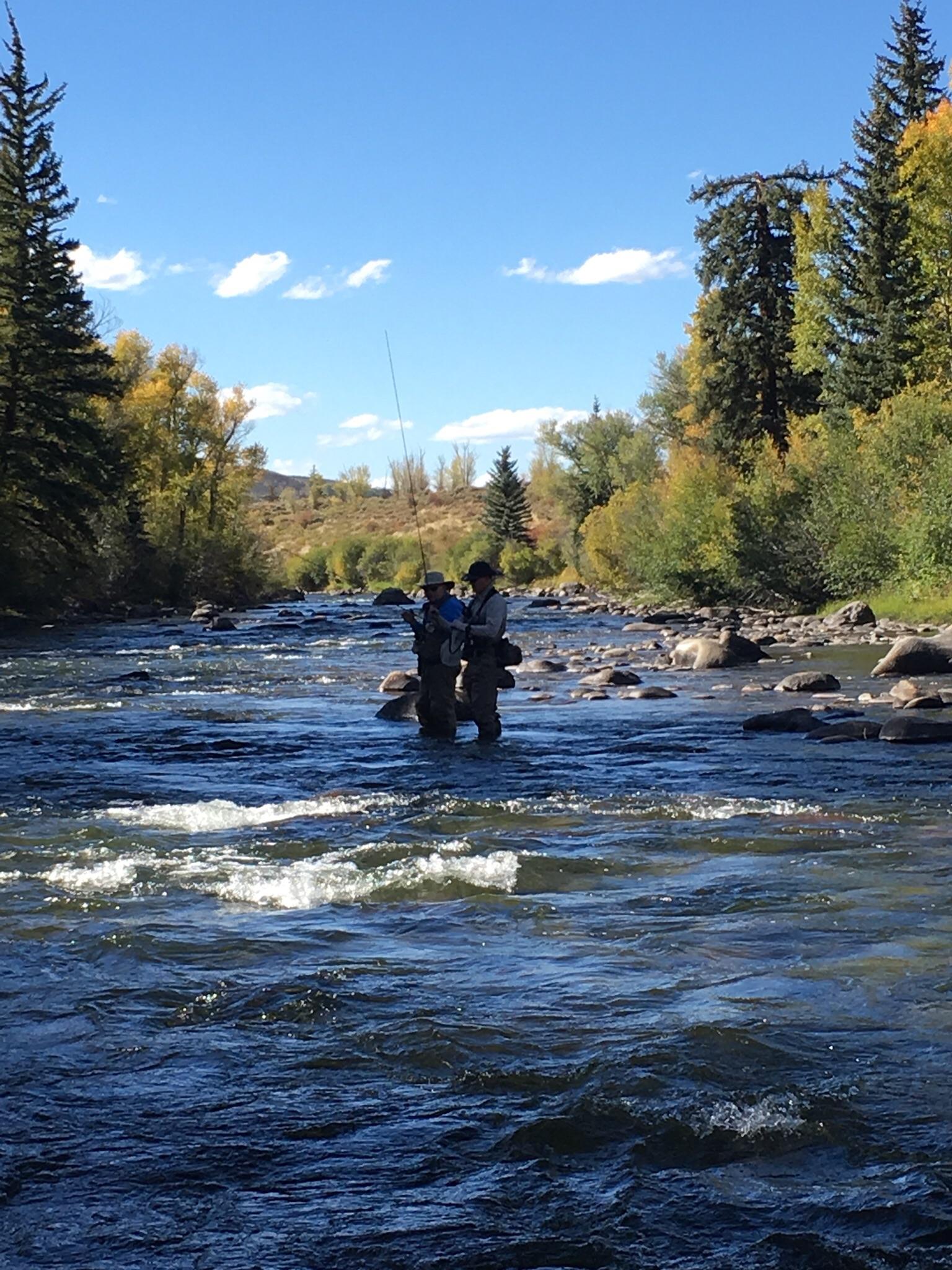 Fall fly Fishing on the Blue River Colorado guiding a friend r