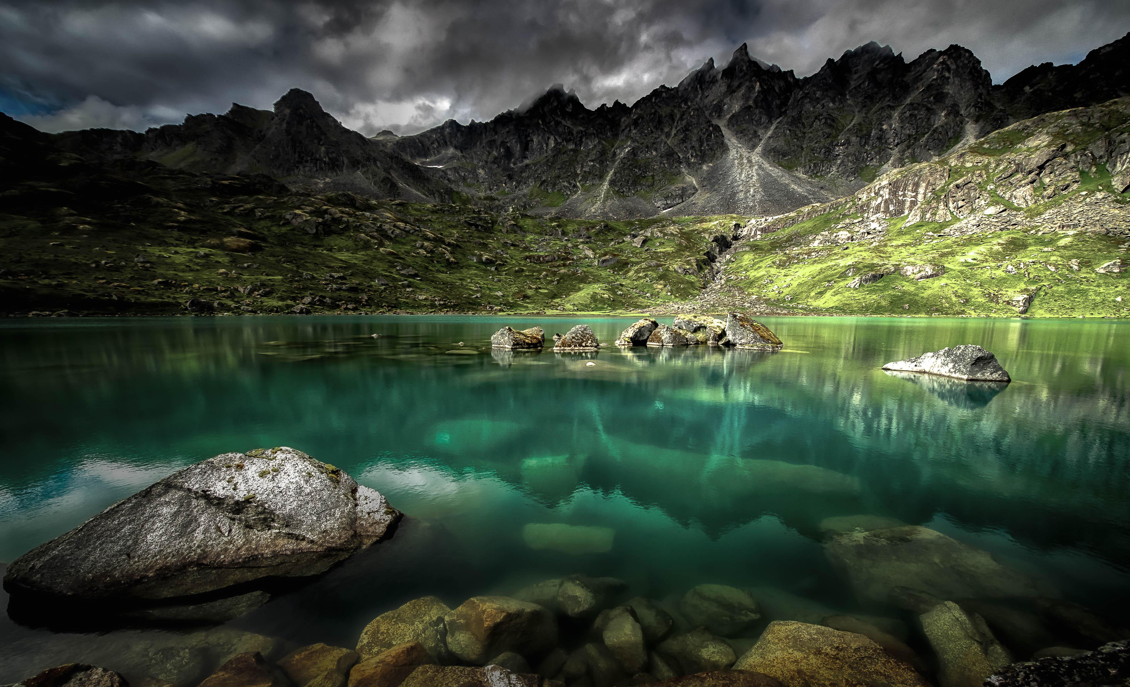 Sun breaks through the clouds at Lower Reed Lake in Hatcher Pass